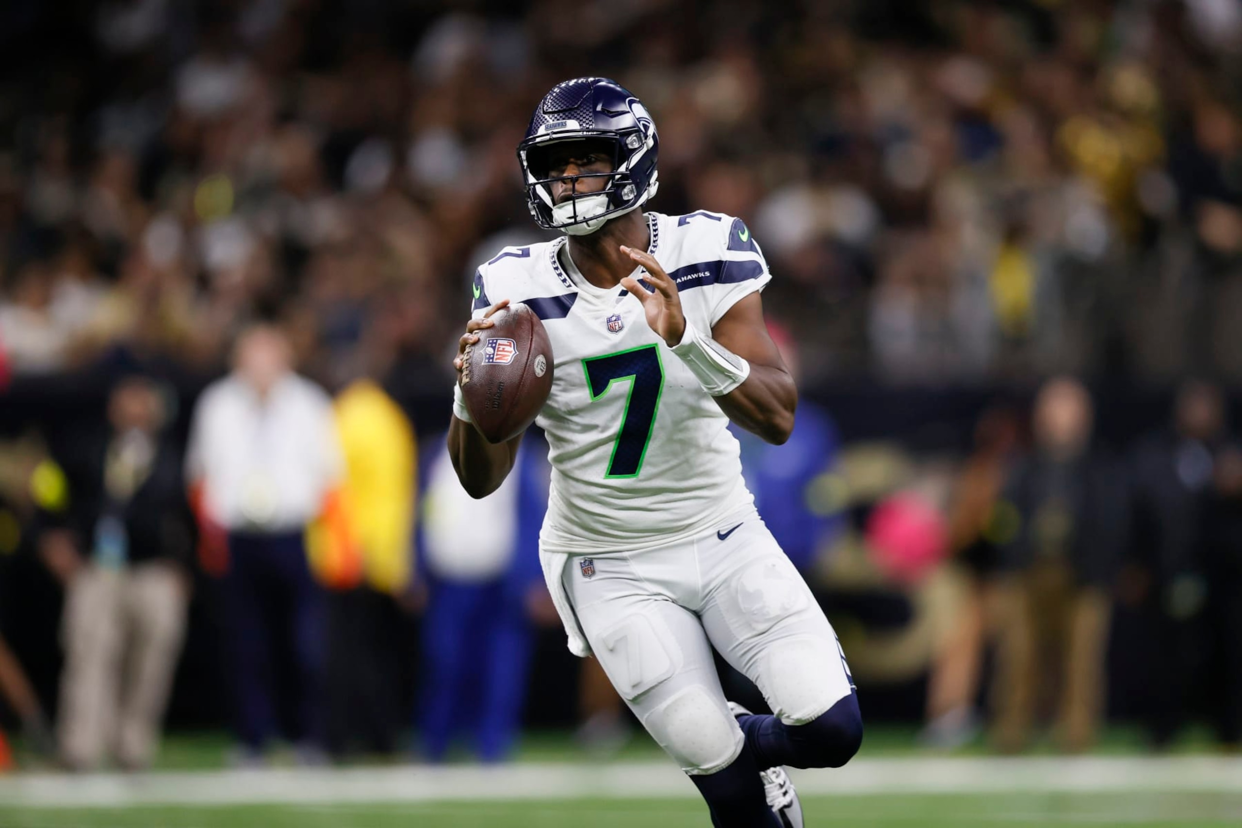 Seattle Seahawks quarterback Geno Smith (7) plays against the New Orleans Saints during an NFL football game in New Orleans, Sunday, Oct. 9, 2022. (AP Photo/Derick Hingle)