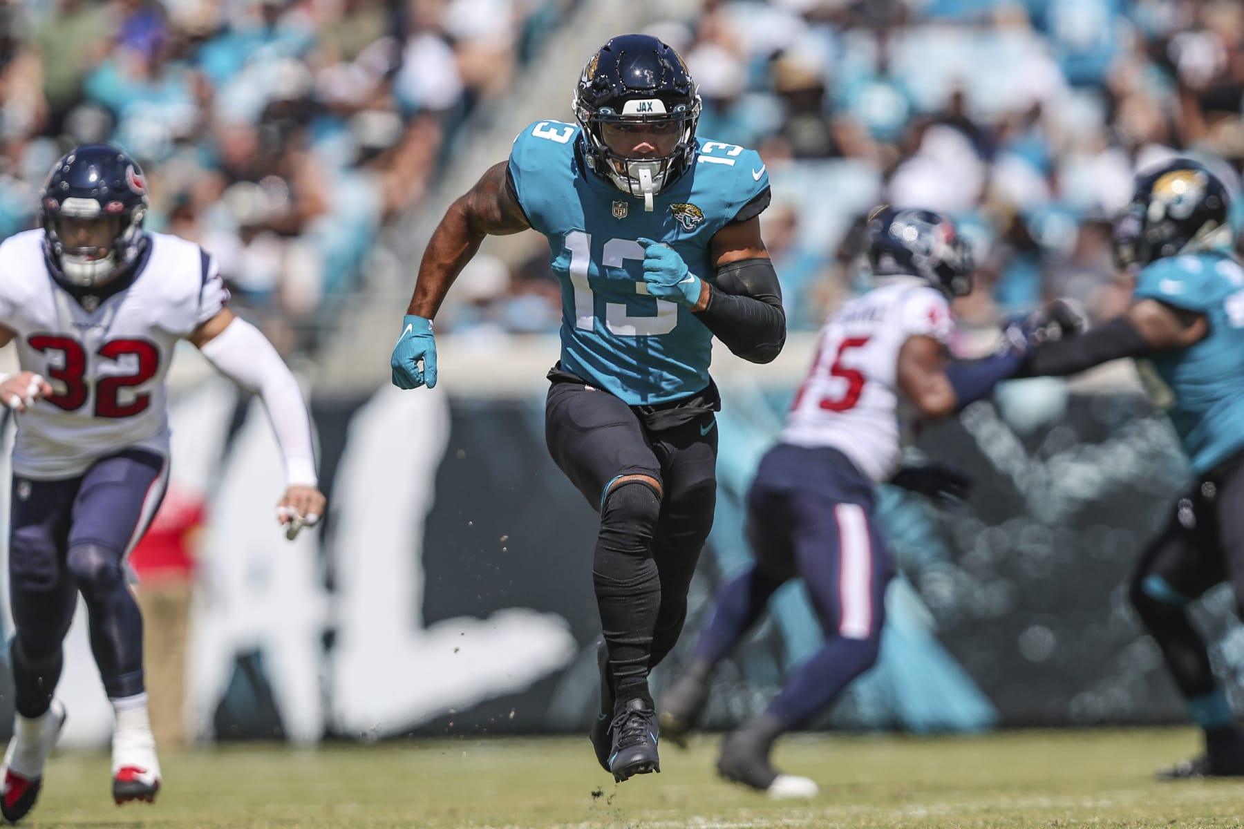 Jacksonville Jaguars wide receiver Christian Kirk (13) runs a route during an NFL football game against the Houston Texans on Sunday, Oct. 9, 2022, in Jacksonville, Fla. (AP Photo/Gary McCullough)