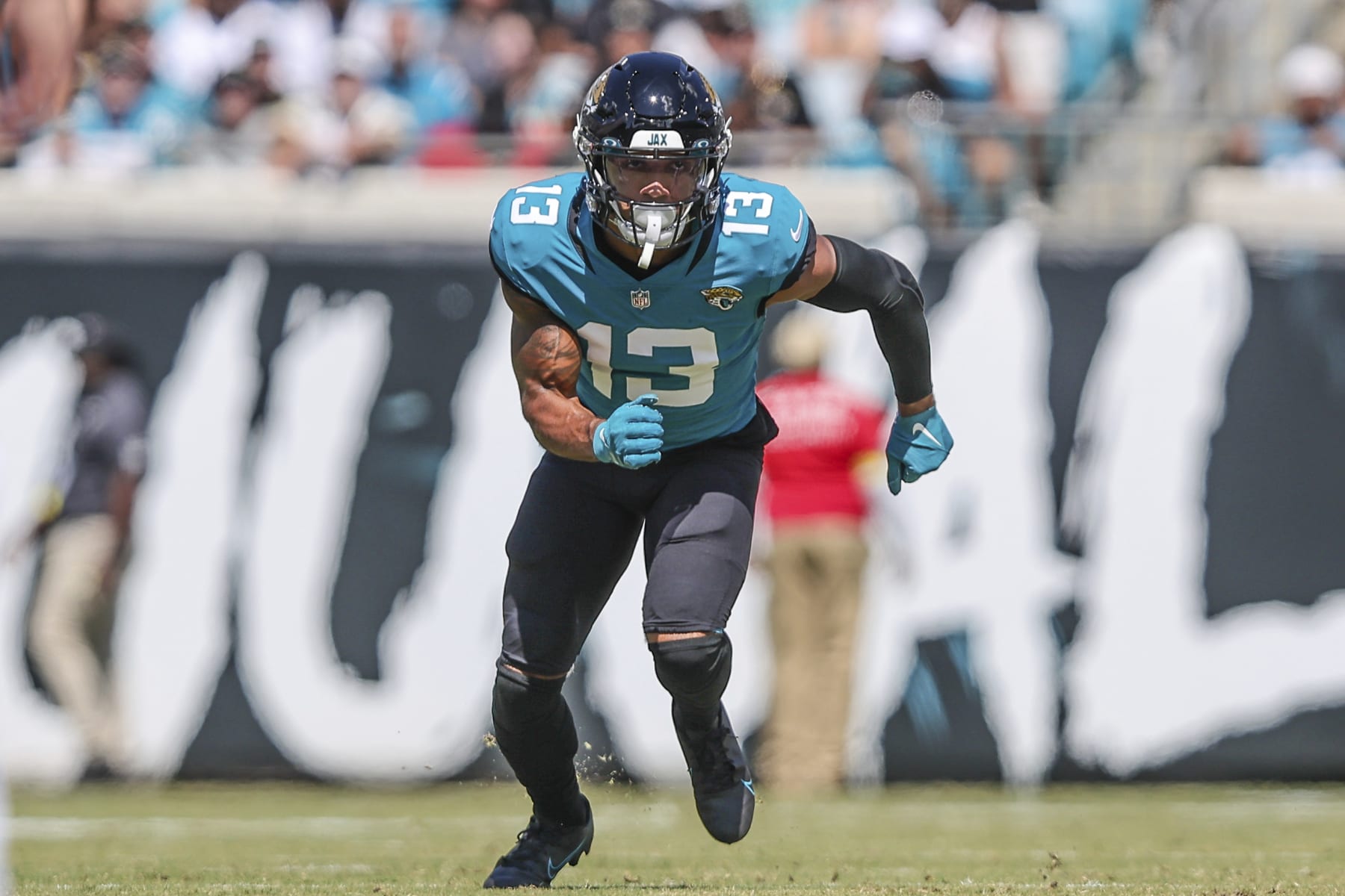Jacksonville Jaguars wide receiver Christian Kirk (13) runs a route during an NFL football game against the Houston Texans on Sunday, Oct. 9, 2022, in Jacksonville, Fla. (AP Photo/Gary McCullough)