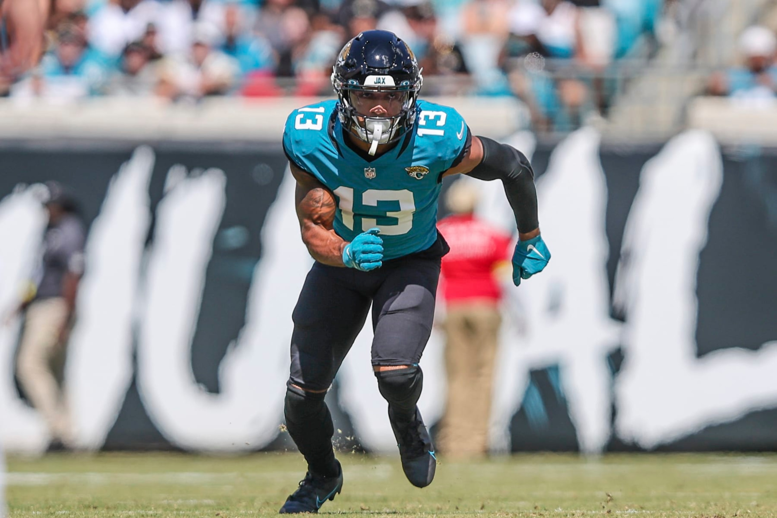 Jacksonville Jaguars wide receiver Christian Kirk (13) runs a route during an NFL football game against the Houston Texans on Sunday, Oct. 9, 2022, in Jacksonville, Fla. (AP Photo/Gary McCullough)