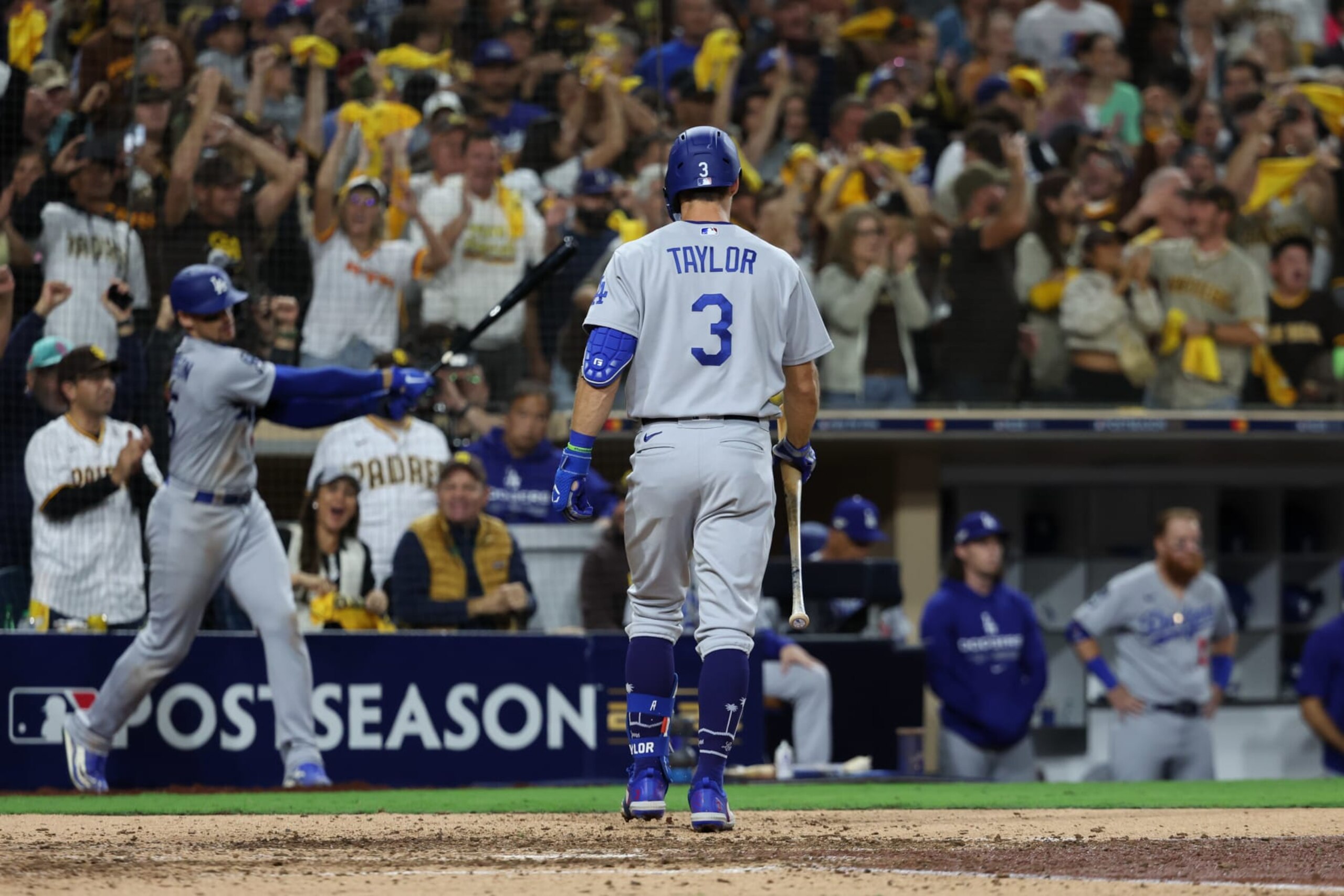 SAN DIEGO, CA - OCTOBER 14:   San Diego Padres fans react as Chris Taylor #3 of the Los Angeles Dodgers walks back to the dugout after striking out in the ninth inning during the game between the Los Angeles Dodgers and the San Diego Padres at Petco Park on Friday, October 14, 2022 in San Diego, California. (Photo by Rob Leiter/MLB Photos via Getty Images)