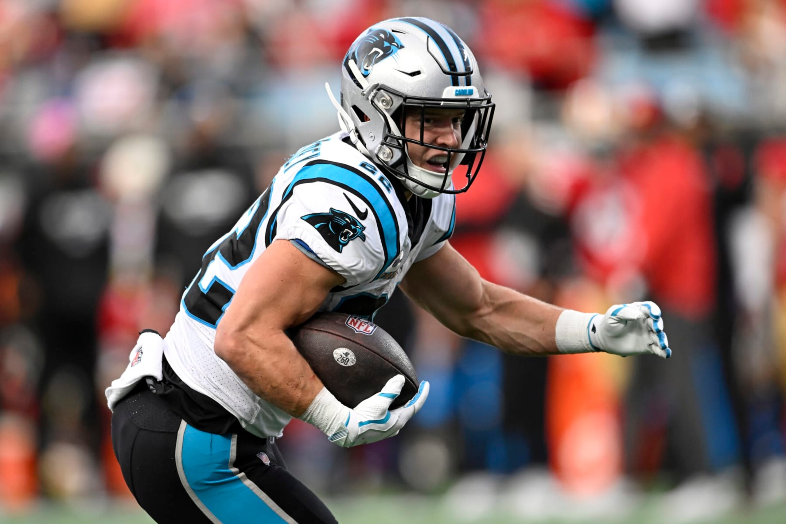 CHARLOTTE, NORTH CAROLINA - OCTOBER 09: Christian McCaffrey #22 of the Carolina Panthers runs the ball against the San Francisco 49ers in the third quarter at Bank of America Stadium on October 09, 2022 in Charlotte, North Carolina. (Photo by Eakin Howard/Getty Images) CHARLOTTE, NORTH CAROLINA - OCTOBER 09: Christian McCaffrey #22 of the Carolina Panthers runs the ball against the San Francisco 49ers in the third quarter at Bank of America Stadium on October 09, 2022 in Charlotte, North Carolina. (Photo by Eakin Howard/Getty Images)