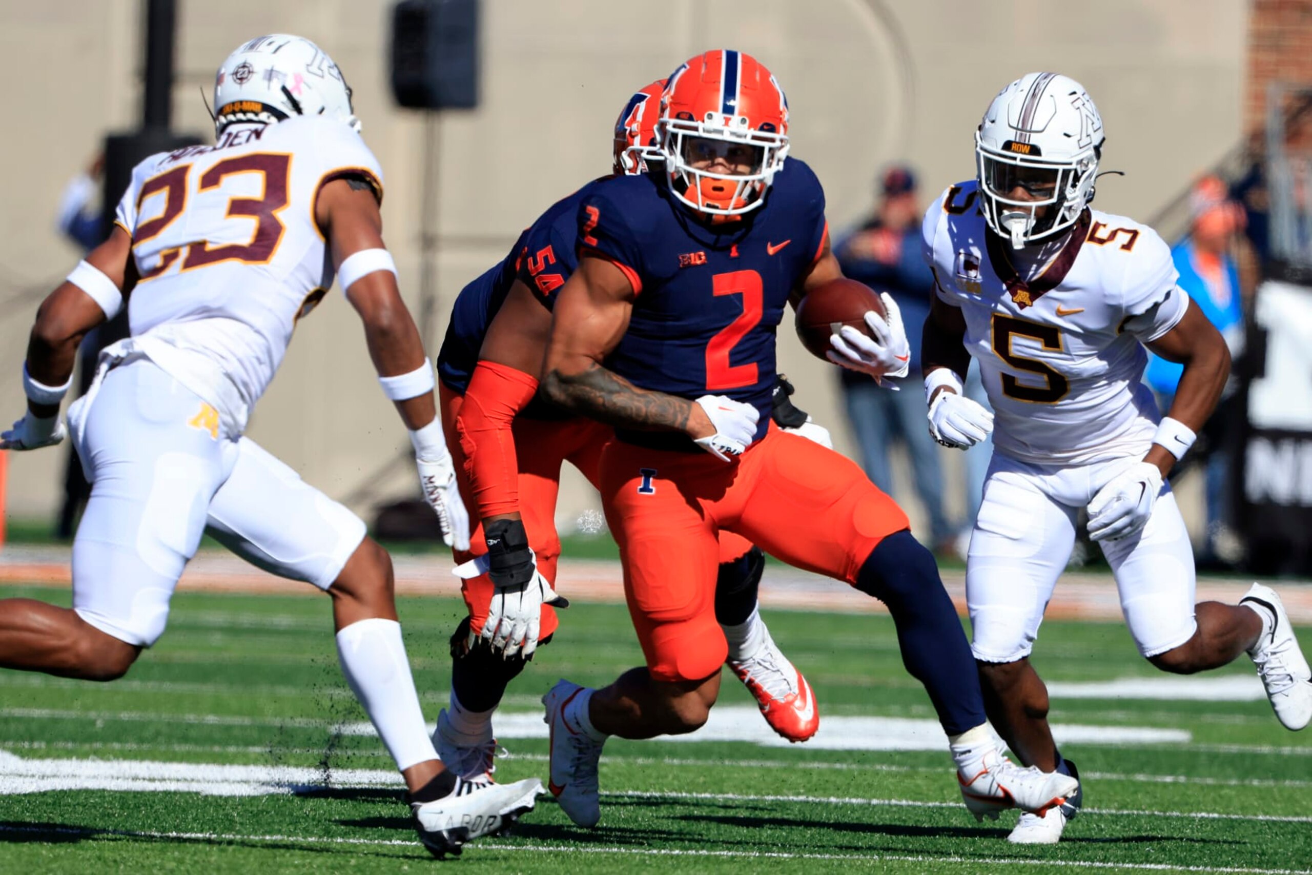 CHAMPAIGN, ILLINOIS - OCTOBER 15: Chase Brown #2 of the Illinois Fighting Illini runs the ball during the first quarter in the game against the Minnesota Golden Gophers at Memorial Stadium on October 15, 2022 in Champaign, Illinois. (Photo by Justin Casterline/Getty Images)