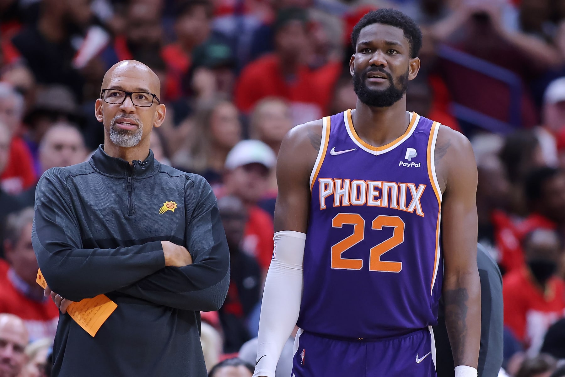 NEW ORLEANS, LOUISIANA - APRIL 24: Deandre Ayton #22 and Head coach Monty Williams of the Phoenix Suns react during Game Four of the Western Conference First Round NBA Playoffs against the New Orleans Pelicans at the Smoothie King Center on April 24, 2022 in New Orleans, Louisiana. NOTE TO USER: User expressly acknowledges and agrees that, by downloading and or using this Photograph, user is consenting to the terms and conditions of the Getty Images License Agreement. (Photo by Jonathan Bachman/Getty Images)