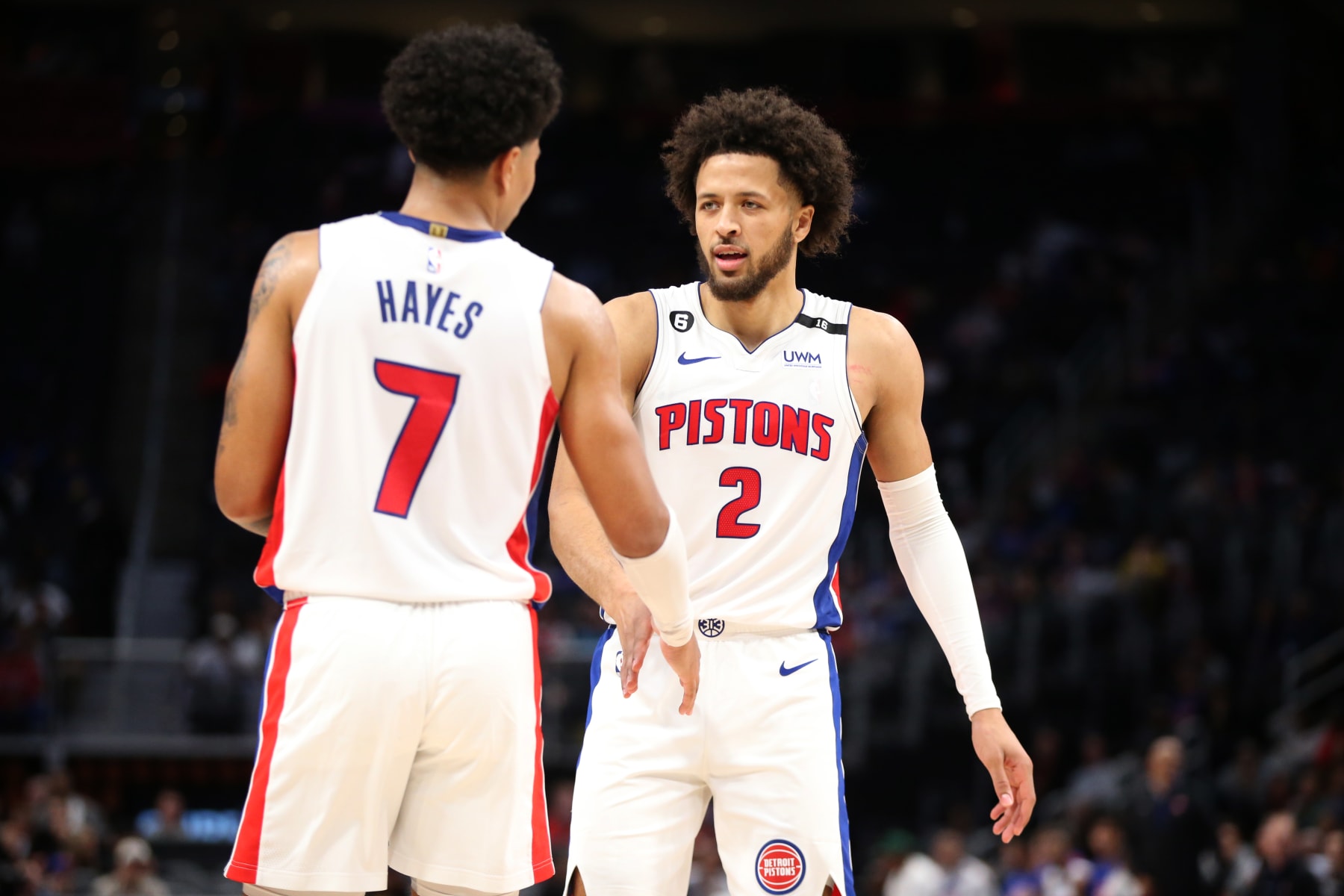 DETROIT, MI - OCTOBER 11: Cade Cunningham #2 of the Detroit Pistons and Killian Hayes #7 celebrate during a preseason game against the Oklahoma City Thunder on October 11, 2022 at Little Caesars Arena in Detroit, Michigan. NOTE TO USER: User expressly acknowledges and agrees that, by downloading and/or using this photograph, User is consenting to the terms and conditions of the Getty Images License Agreement. Mandatory Copyright Notice: Copyright 2022 NBAE (Photo by Brian Sevald/NBAE via Getty Images)