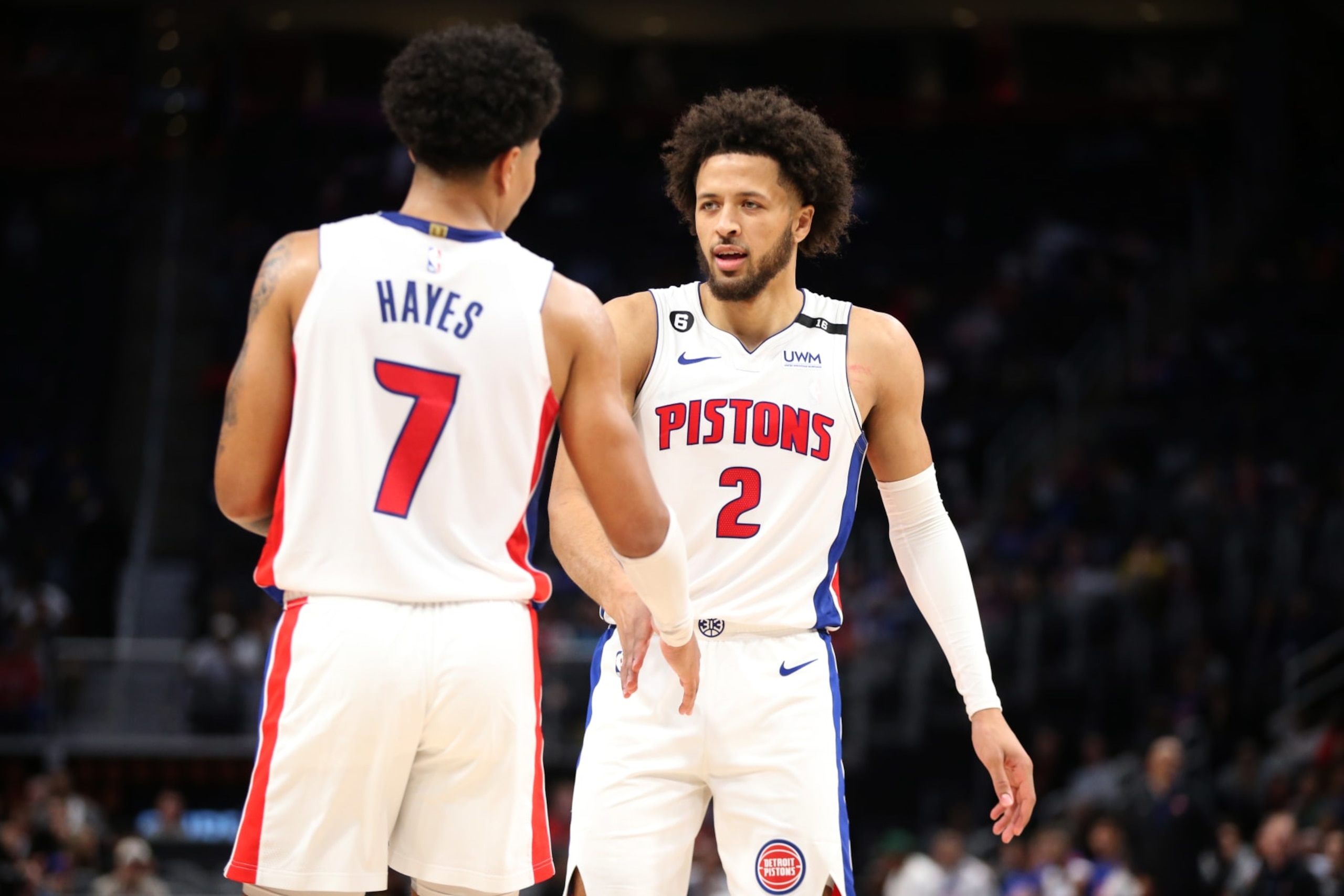 DETROIT, MI - OCTOBER 11: Cade Cunningham #2 of the Detroit Pistons and Killian Hayes #7 celebrate during a preseason game against the Oklahoma City Thunder on October 11, 2022 at Little Caesars Arena in Detroit, Michigan. NOTE TO USER: User expressly acknowledges and agrees that, by downloading and/or using this photograph, User is consenting to the terms and conditions of the Getty Images License Agreement. Mandatory Copyright Notice: Copyright 2022 NBAE (Photo by Brian Sevald/NBAE via Getty Images)
