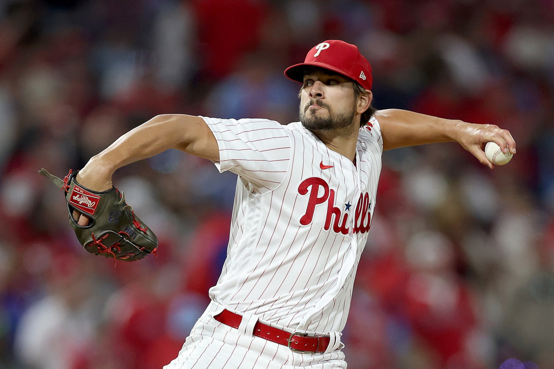 PHILADELPHIA, PENNSYLVANIA - OCTOBER 14: Brad Hand #52 of the Philadelphia Phillies throws a pitch against the Atlanta Braves during the eighth inning in game three of the National League Division Series at Citizens Bank Park on October 14, 2022 in Philadelphia, Pennsylvania. (Photo by Patrick Smith/Getty Images)