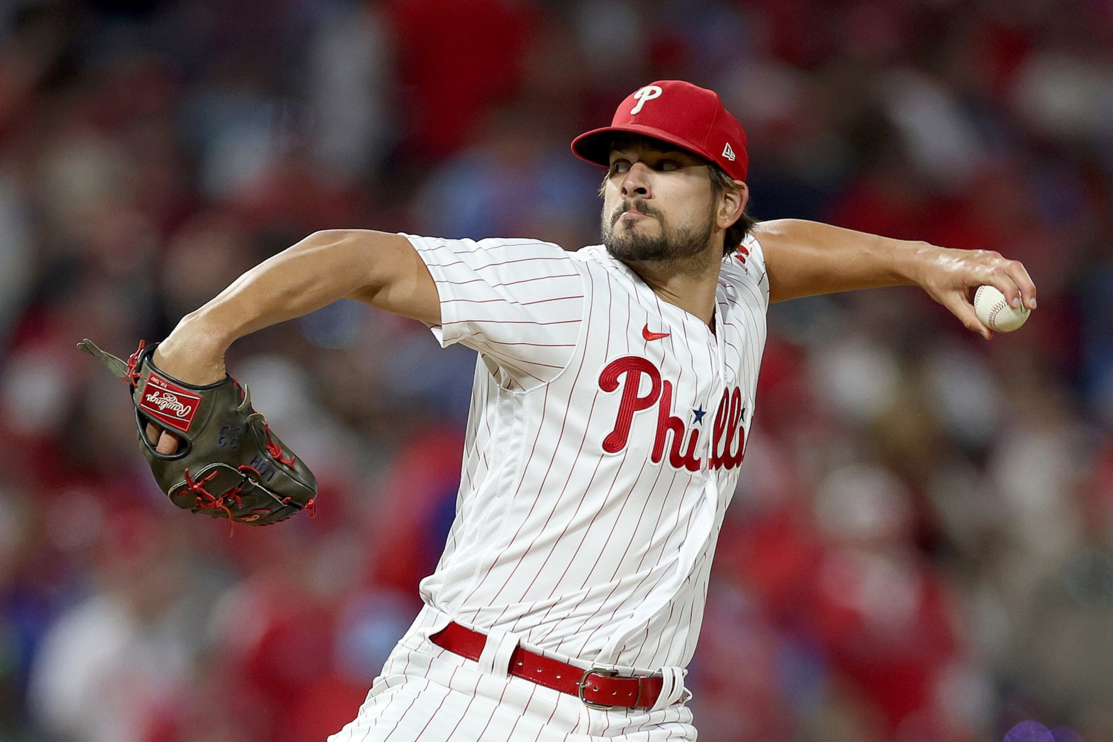 PHILADELPHIA, PENNSYLVANIA - OCTOBER 14: Brad Hand #52 of the Philadelphia Phillies throws a pitch against the Atlanta Braves during the eighth inning in game three of the National League Division Series at Citizens Bank Park on October 14, 2022 in Philadelphia, Pennsylvania. (Photo by Patrick Smith/Getty Images) PHILADELPHIA, PENNSYLVANIA - OCTOBER 14: Brad Hand #52 of the Philadelphia Phillies throws a pitch against the Atlanta Braves during the eighth inning in game three of the National League Division Series at Citizens Bank Park on October 14, 2022 in Philadelphia, Pennsylvania. (Photo by Patrick Smith/Getty Images)