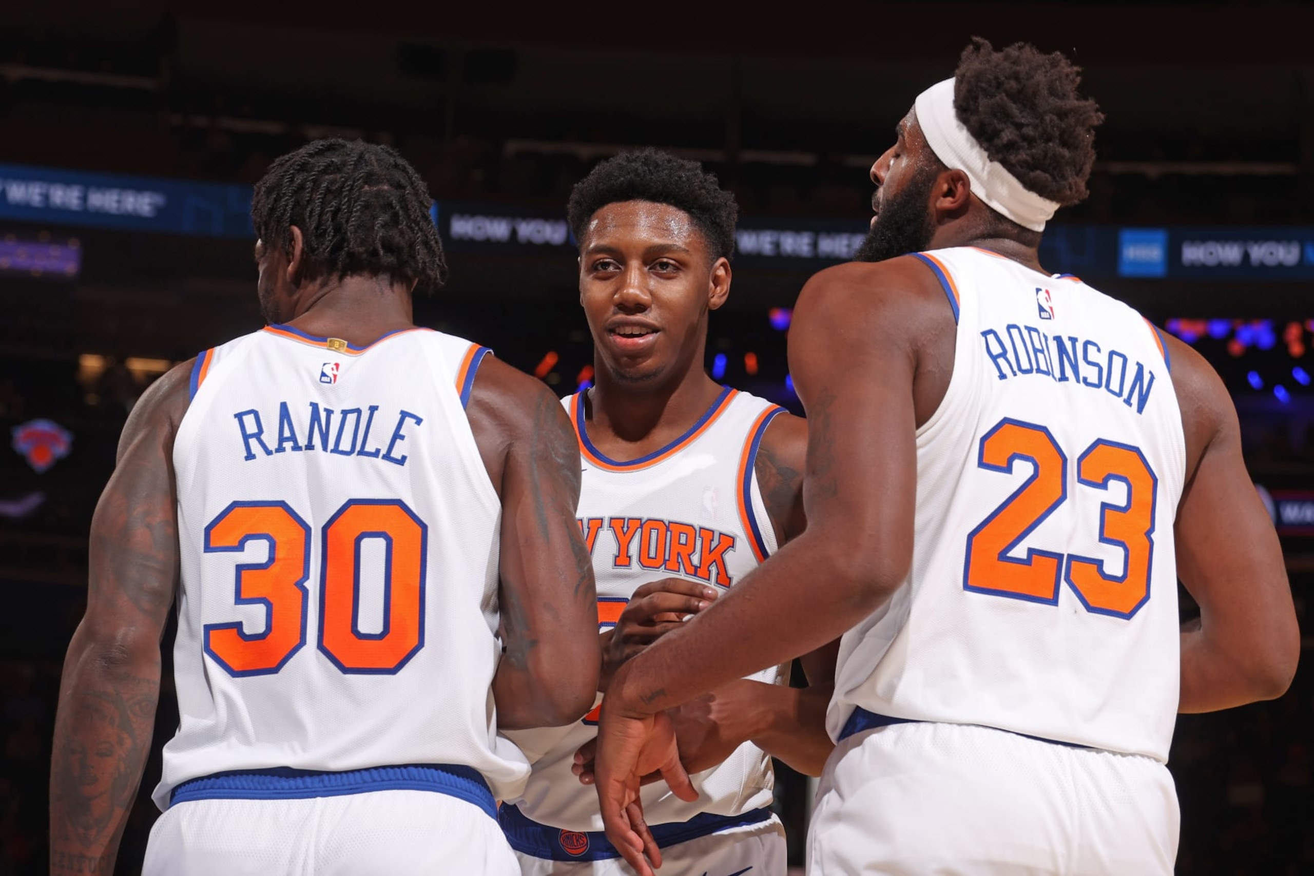 NEW YORK, NY - OCTOBER 14: RJ Barrett #9, Julius Randle #30 and Mitchell Robinson #23 of the New York Knicks huddle up against the Washington Wizards during a preseason game on October 14, 2022 at Madison Square Garden in New York City, New York. NOTE TO USER: User expressly acknowledges and agrees that, by downloading and or using this photograph, User is consenting to the terms and conditions of the Getty Images License Agreement. Mandatory Copyright Notice: Copyright 2022 NBAE (Photo by Nathaniel S. Butler/NBAE via Getty Images)