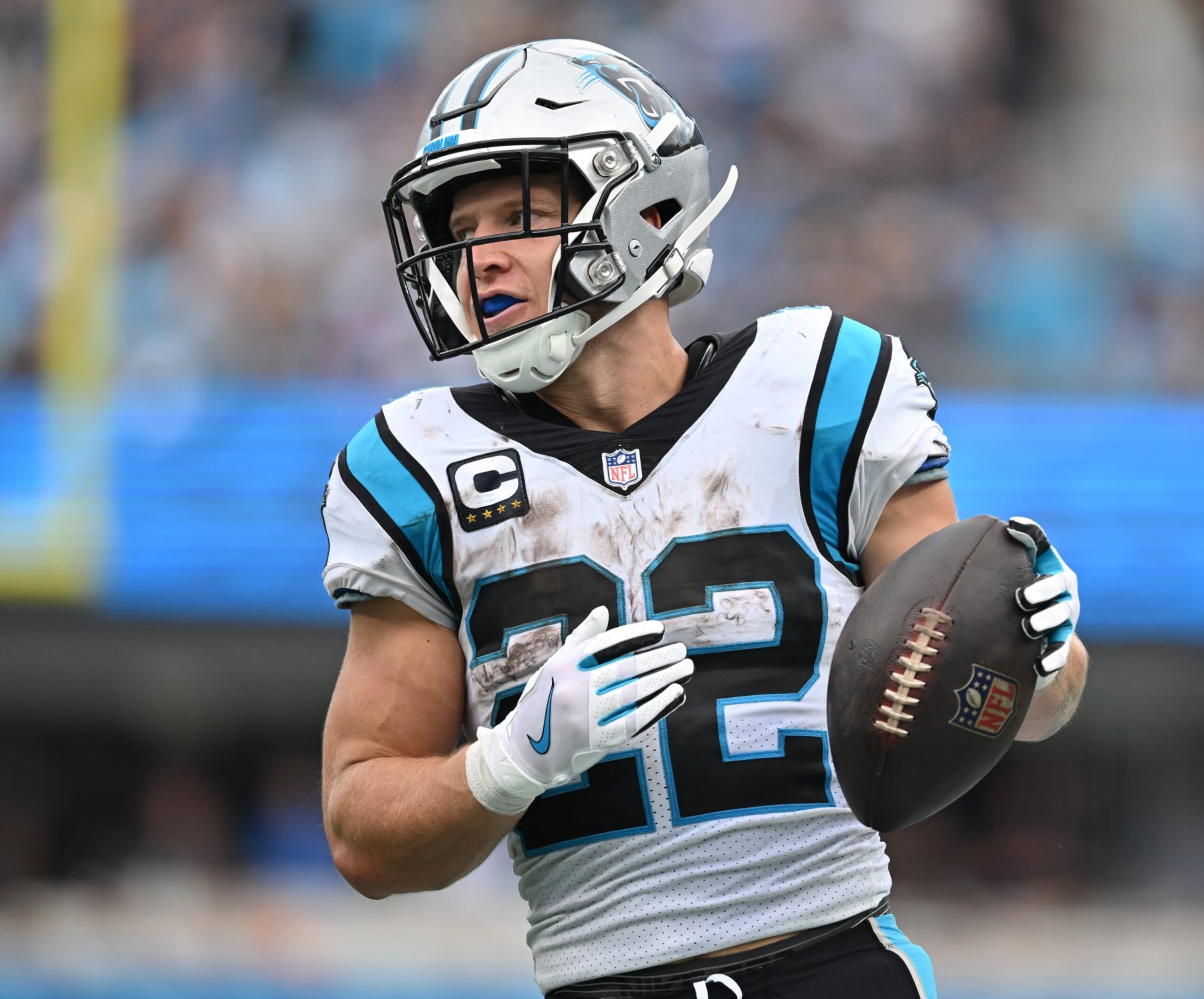 CHARLOTTE, NORTH CAROLINA - SEPTEMBER 25: Christian McCaffrey #22 of the Carolina Panthers runs against the New Orleans Saints during their game at Bank of America Stadium on September 25, 2022 in Charlotte, North Carolina. (Photo by Grant Halverson/Getty Images)