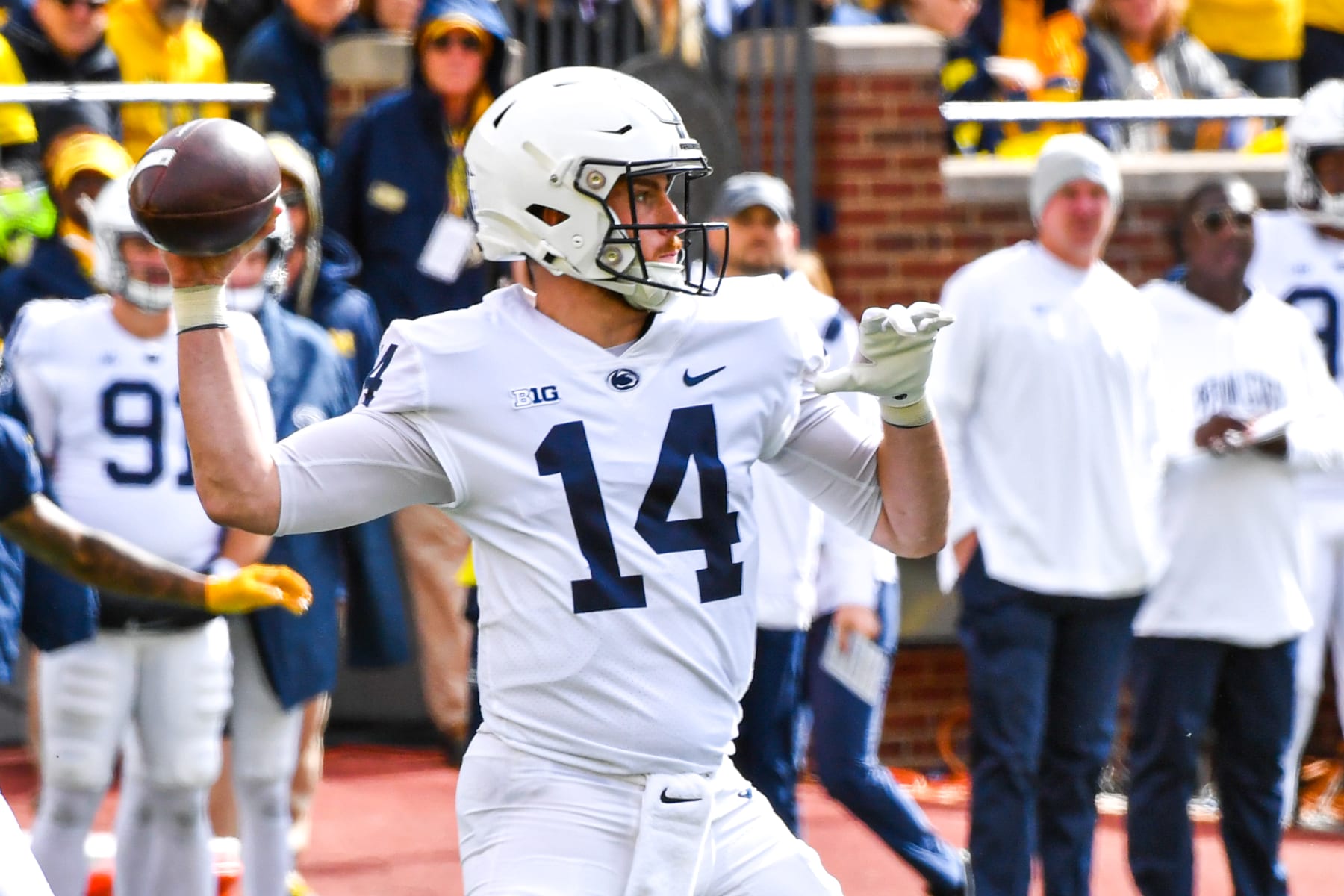 ANN ARBOR, MICHIGAN - OCTOBER 15: Sean Clifford #14 of the Penn State Nittany Lions attempts a pass during the first half of a college football game against the Michigan Wolverines at Michigan Stadium on October 15, 2022 in Ann Arbor, Michigan. (Photo by Aaron J. Thornton/Getty Images)