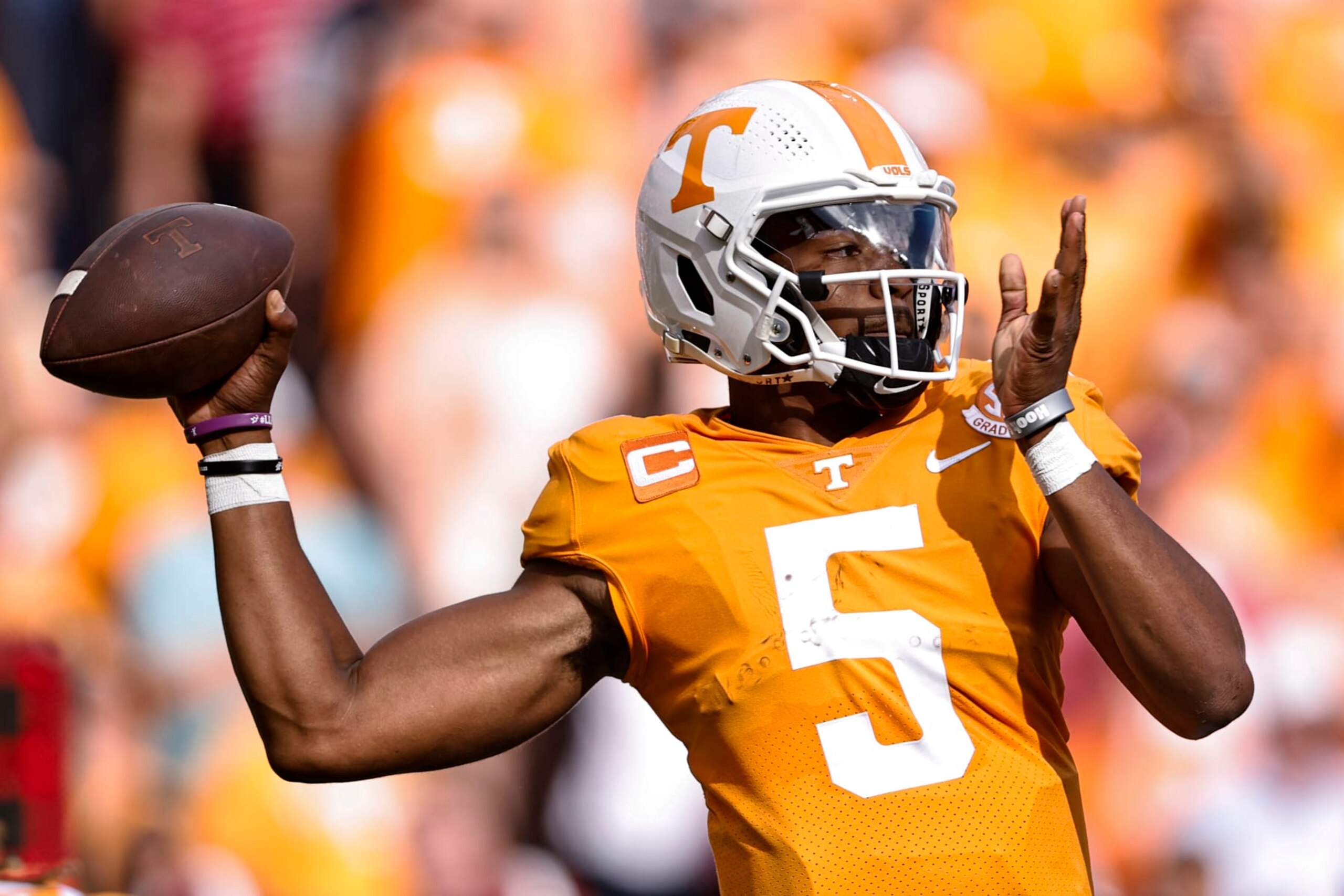 Tennessee quarterback Hendon Hooker (5) throws to a receiver during the first half of an NCAA college football game against Alabama Saturday, Oct. 15, 2022, in Knoxville, Tenn. (AP Photo/Wade Payne) Tennessee quarterback Hendon Hooker (5) throws to a receiver during the first half of an NCAA college football game against Alabama Saturday, Oct. 15, 2022, in Knoxville, Tenn. (AP Photo/Wade Payne)
