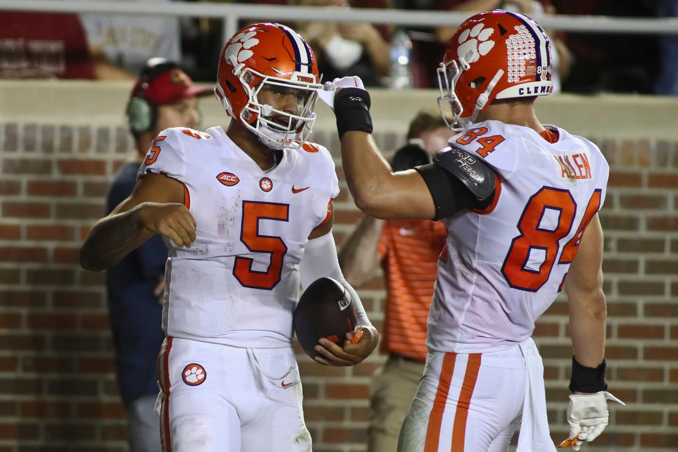 Clemson quarterback DJ Uiagalelei (5) celebrates his touchdown with tight end Davis Allen (84) during the second quarter of the team's NCAA college football game against Florida State on Saturday, Oct. 15, 2022, in Tallahassee, Fla. (AP Photo/Phil Sears)