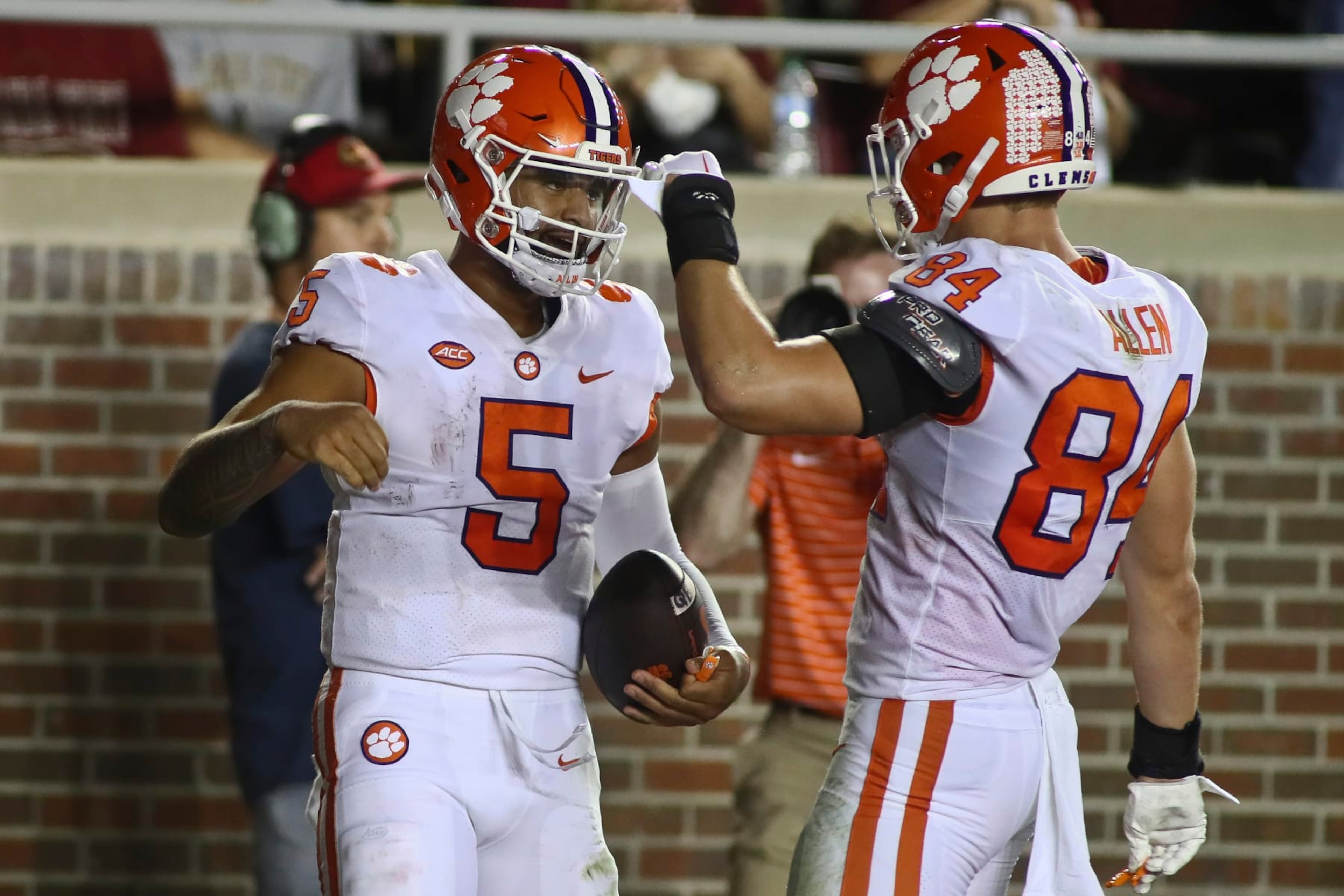 Clemson quarterback DJ Uiagalelei (5) celebrates his touchdown with tight end Davis Allen (84) during the second quarter of the team's NCAA college football game against Florida State on Saturday, Oct. 15, 2022, in Tallahassee, Fla. (AP Photo/Phil Sears)