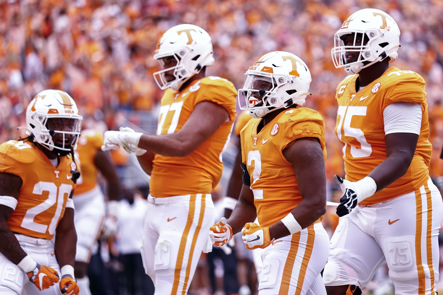 Tennessee running back Jabari Small (2) celebrates with teammates after scoring a touchdown during the first half of an NCAA college football game against Alabama, Saturday, Oct. 15, 2022, in Knoxville, Tenn. (AP Photo/Wade Payne)