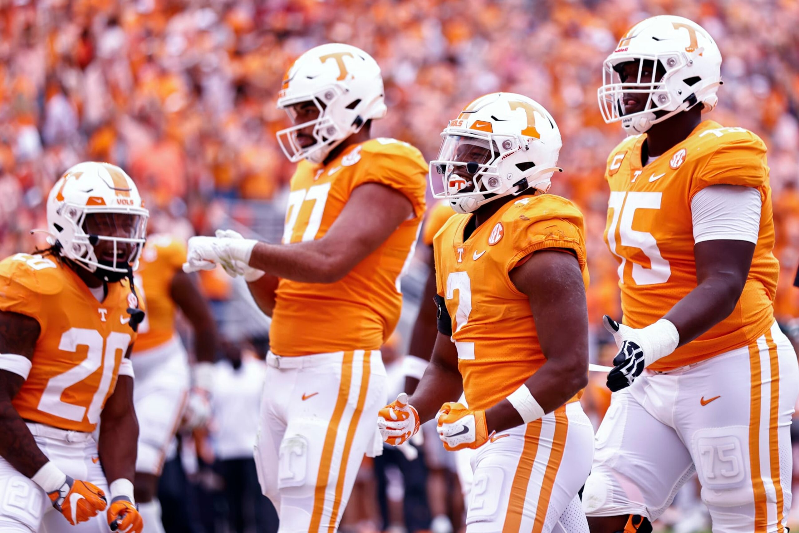 Tennessee running back Jabari Small (2) celebrates with teammates after scoring a touchdown during the first half of an NCAA college football game against Alabama, Saturday, Oct. 15, 2022, in Knoxville, Tenn. (AP Photo/Wade Payne)