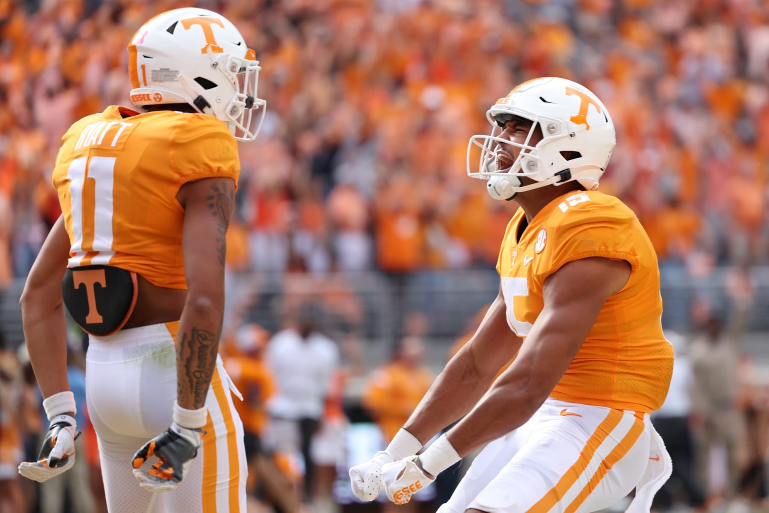 KNOXVILLE, TENNESSEE - OCTOBER 15: Wide receiver Jalin Hyatt #11 and wide receiver Bru McCoy #15 of the Tennessee Volunteers celebrate after a touchdown in the first quarter against the Alabama Crimson Tide at Neyland Stadium on October 15, 2022 in Knoxville, Tennessee. (Photo by Donald Page/Getty Images)