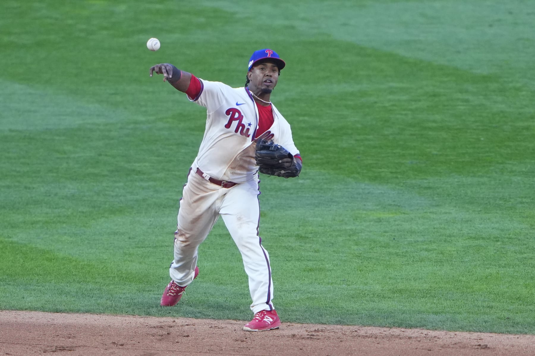 PHILADELPHIA, PA - OCTOBER 15: Philadelphia Phillies Second Baseman Jean Segura (2) throws out Atlanta Braves Right Fielder Ronald Acuna Jr. (13) (not pictured) after fielding a ground ball during the eighth inning of Game 4 of the NLDS between the Atlanta Braves and the Philadelphia Phillies on October 15, 2022, at Citizens Bank Park in Philadelphia, PA.(Photo by Gregory Fisher/Icon Sportswire via Getty Images)