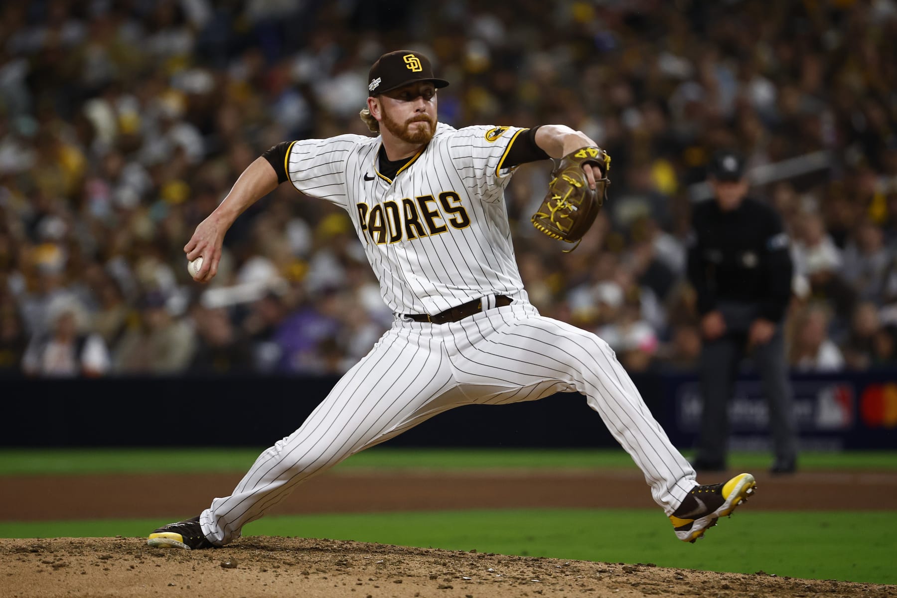 SAN DIEGO, CALIFORNIA - OCTOBER 15: Steven Wilson #48 of the San Diego Padres pitches during the seventh inning against the Los Angeles Dodgers in game four of the National League Division Series at PETCO Park on October 15, 2022 in San Diego, California. (Photo by Ronald Martinez/Getty Images)