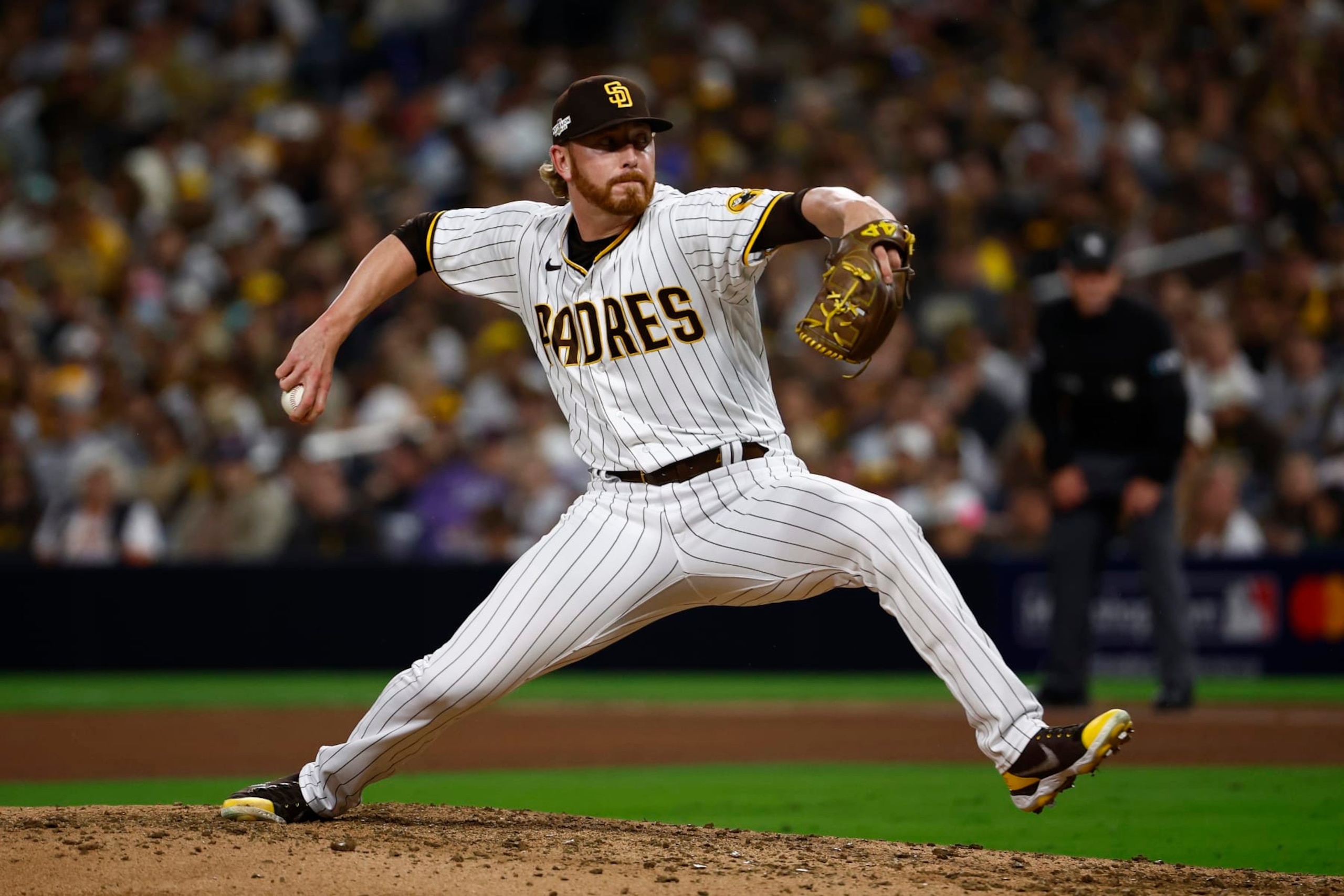 SAN DIEGO, CALIFORNIA - OCTOBER 15: Steven Wilson #48 of the San Diego Padres pitches during the seventh inning against the Los Angeles Dodgers in game four of the National League Division Series at PETCO Park on October 15, 2022 in San Diego, California. (Photo by Ronald Martinez/Getty Images)