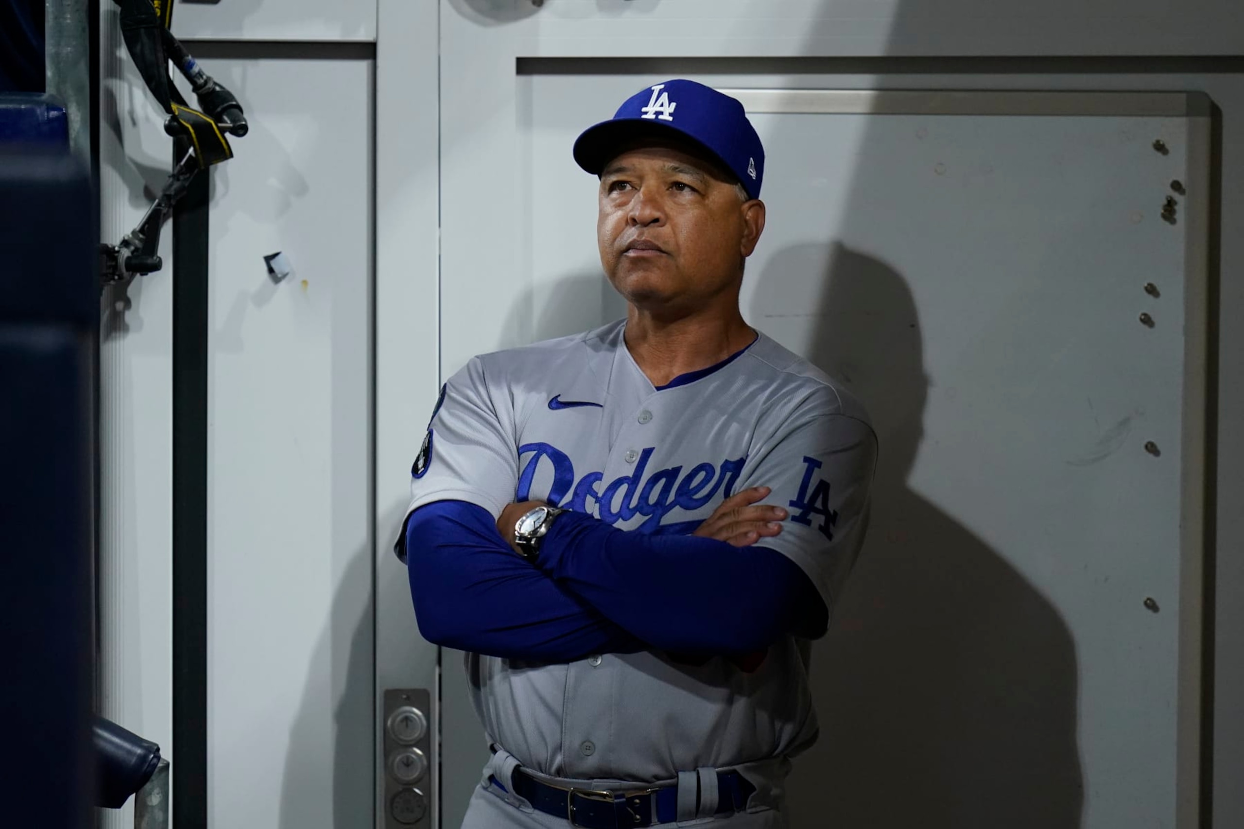 Los Angeles Dodgers manager Dave Roberts looks on before Game 4 of a baseball NL Division Series against the San Diego Padres, Saturday, Oct. 15, 2022, in San Diego. (AP Photo/Jae C. Hong)
