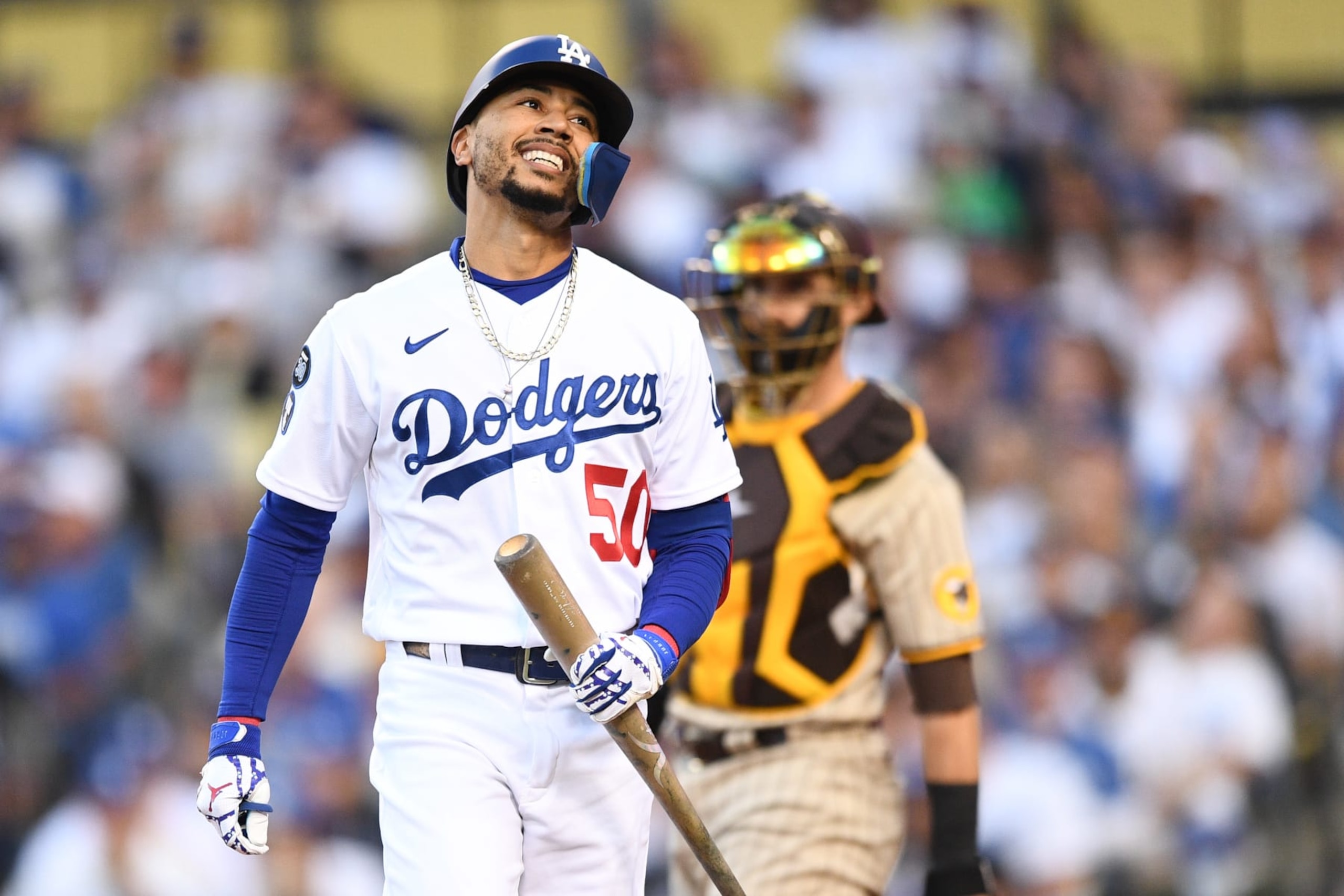 LOS ANGELES, CA - OCTOBER 12: Los Angeles Dodgers right fielder Mookie Betts (50) reacts after striking out during the NLDS Game 2 between the San Diego Padres and the Los Angeles Dodgers on October 12, 2022 at Dodger Stadium in Los Angeles, CA. (Photo by Brian Rothmuller/Icon Sportswire via Getty Images)