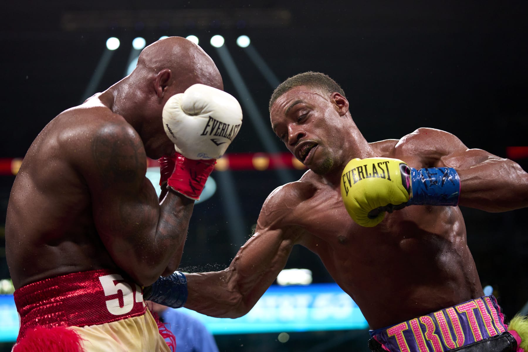ARLINGTON, TX - APRIL 16:  Errol Spence Jr. connects with a punch against Yordenis Ugas at AT&T Stadium on April 16, 2022 in Arlington, Texas.  (Photo by Cooper Neill/Getty Images)