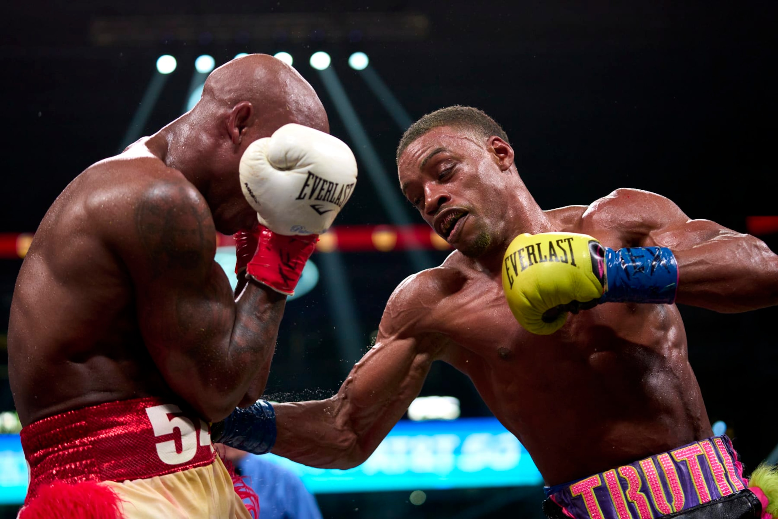 ARLINGTON, TX - APRIL 16:  Errol Spence Jr. connects with a punch against Yordenis Ugas at AT&T Stadium on April 16, 2022 in Arlington, Texas.  (Photo by Cooper Neill/Getty Images)