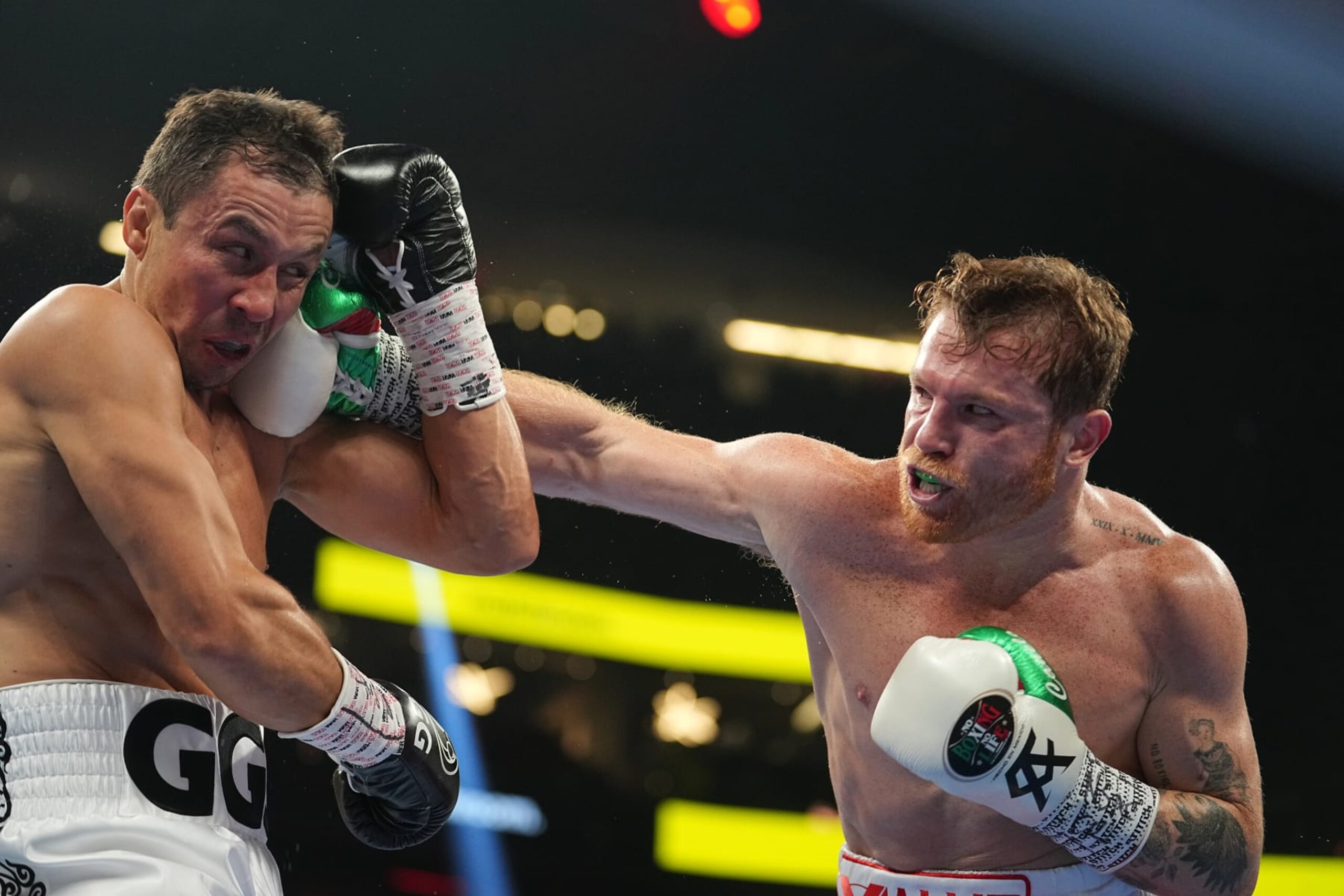 Boxing: WBA/WBO/WBC/IBF World Super Middleweight Title: Canelo Alvarez (Red Trunks) in action, throws a punch vs Gennady Golovkin (White Trunks) during fight at T-Mobile Arena. 
Las Vegas, NV 9/17/2022 
CREDIT: Erick W. Rasco (Photo by Erick W. Rasco/Sports Illustrated via Getty Images) 
(Set Number: X164158 TK2)