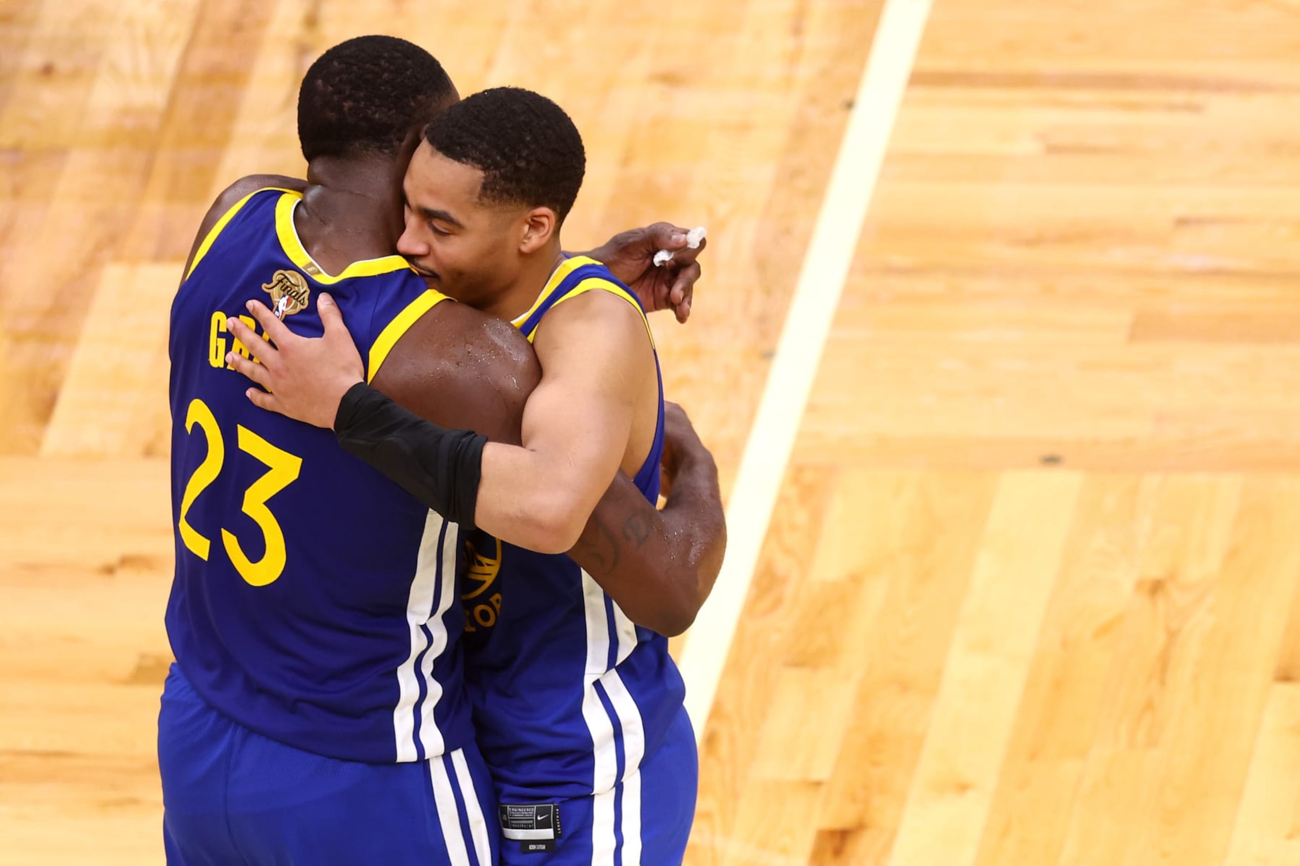 BOSTON, MASSACHUSETTS - JUNE 16: Jordan Poole #3 and Draymond Green #23 of the Golden State Warriors celebrate against the Boston Celtics during the fourth quarter in Game Six of the 2022 NBA Finals at TD Garden on June 16, 2022 in Boston, Massachusetts. NOTE TO USER: User expressly acknowledges and agrees that, by downloading and/or using this photograph, User is consenting to the terms and conditions of the Getty Images License Agreement. (Photo by Adam Glanzman/Getty Images)
