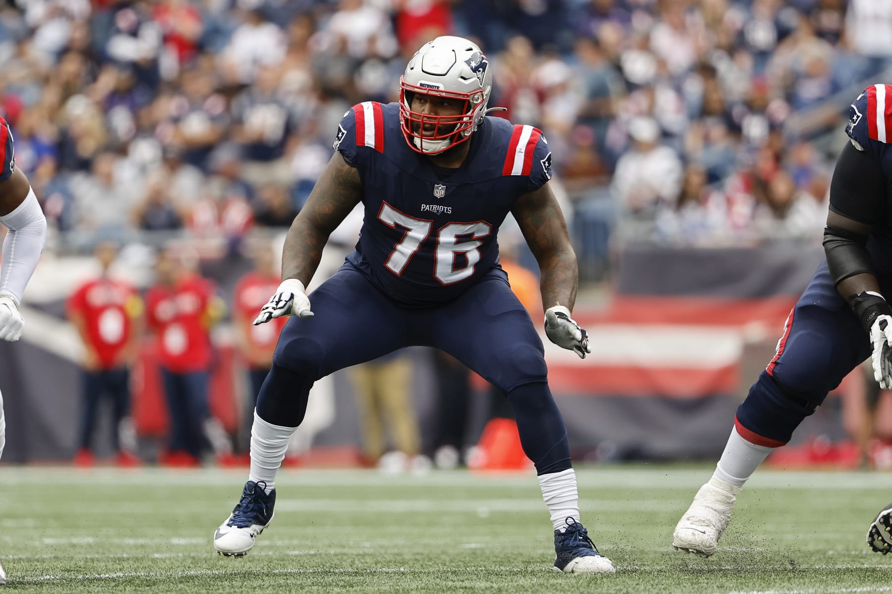 New England Patriots offensive tackle Isaiah Wynn looks to block against the Baltimore Ravens during an NFL football game at Gillette Stadium, Sunday, Sunday, Sept. 24, 2022 in Foxborough, Mass. (Winslow Townson/AP Images for Panini)