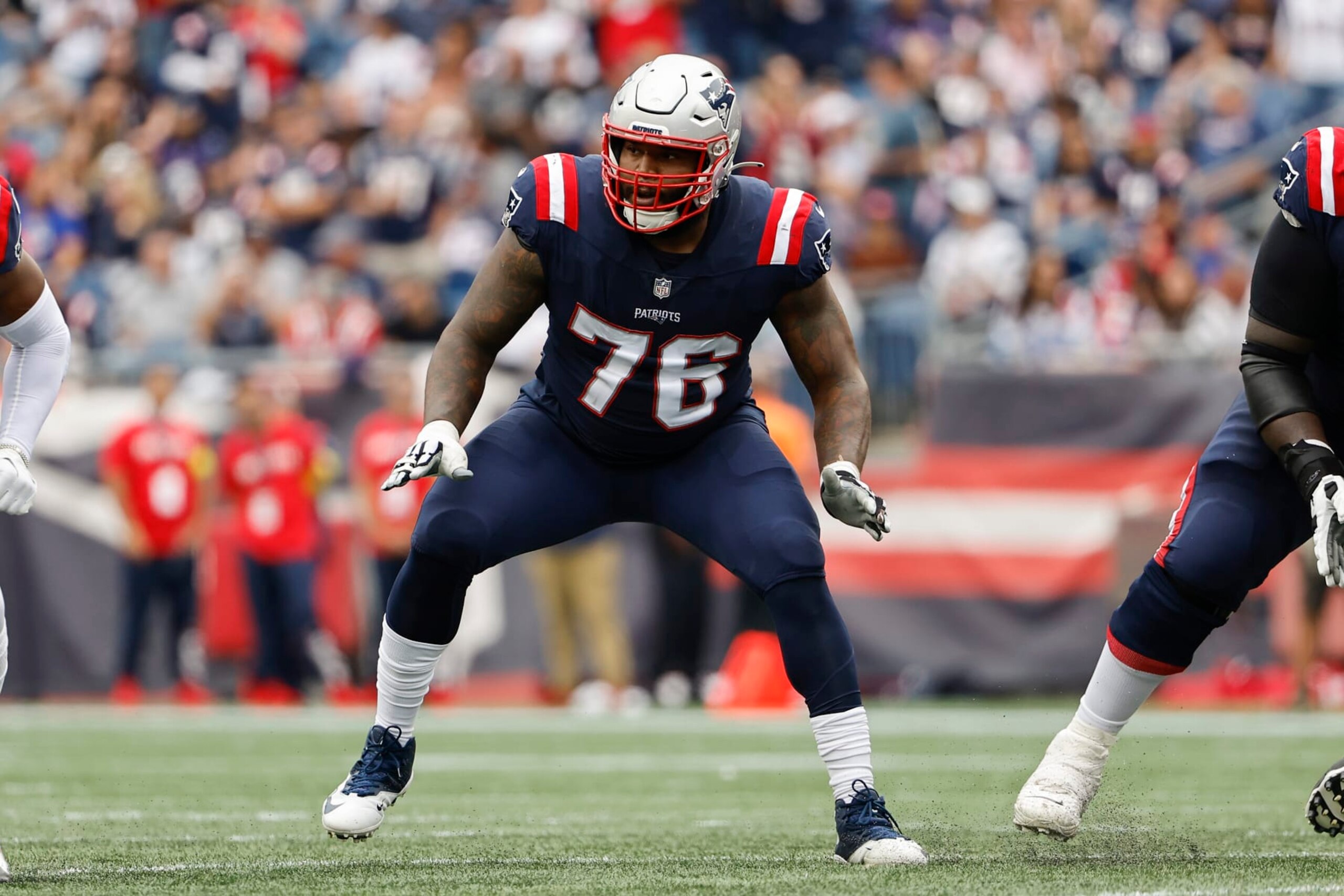 New England Patriots offensive tackle Isaiah Wynn looks to block against the Baltimore Ravens during an NFL football game at Gillette Stadium, Sunday, Sunday, Sept. 24, 2022 in Foxborough, Mass. (Winslow Townson/AP Images for Panini) New England Patriots offensive tackle Isaiah Wynn looks to block against the Baltimore Ravens during an NFL football game at Gillette Stadium, Sunday, Sunday, Sept. 24, 2022 in Foxborough, Mass. (Winslow Townson/AP Images for Panini)