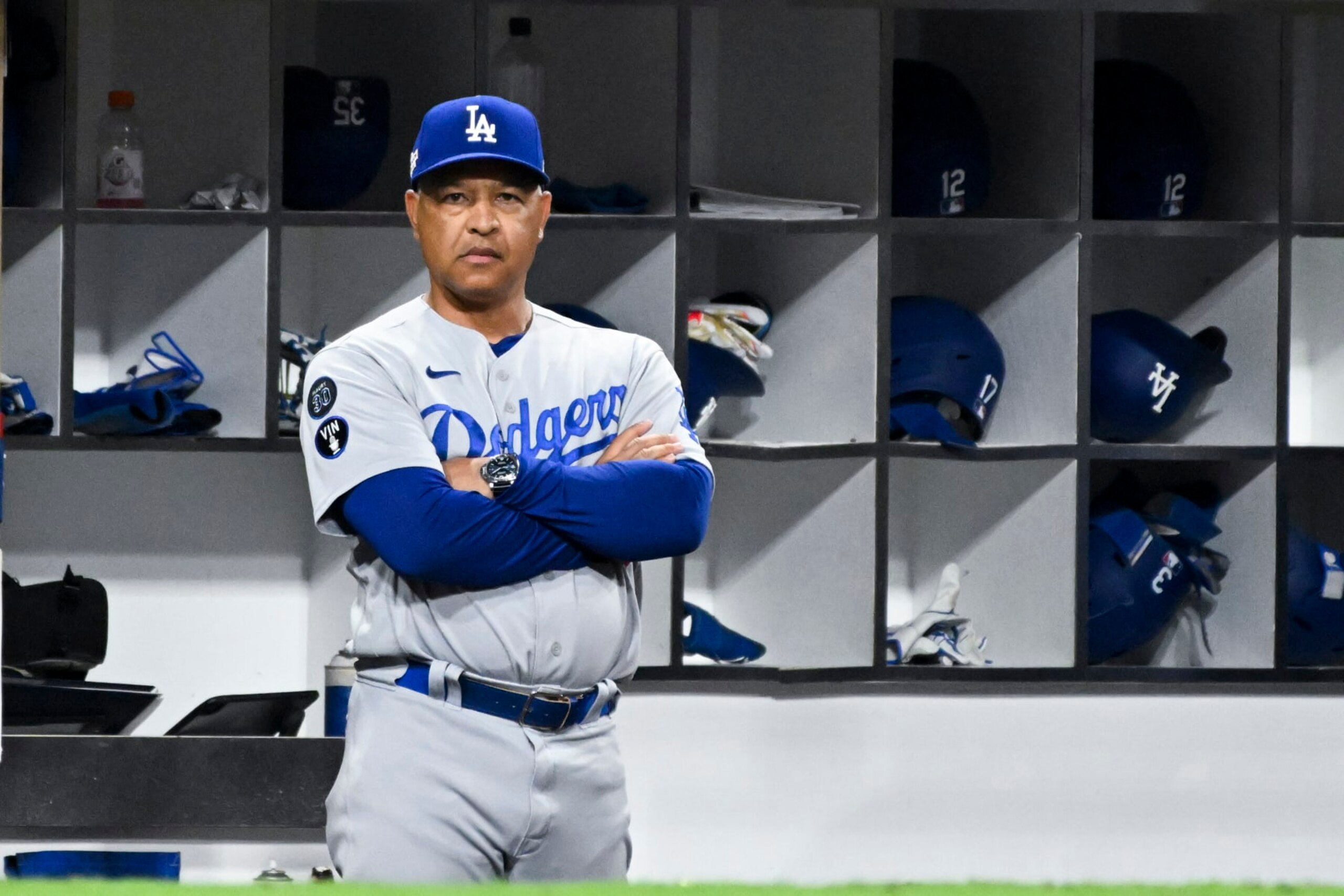 San Diego, CA - October 14: Los Angeles Dodgers manager Dave Roberts watches from the dugout in game 3 of the NLDS against the San Diego Padres at Petco Park on Friday, Oct. 14, 2022 in San Diego, CA. The Padres won 2-1. (Wally Skalij / Los Angeles Times via Getty Images)
