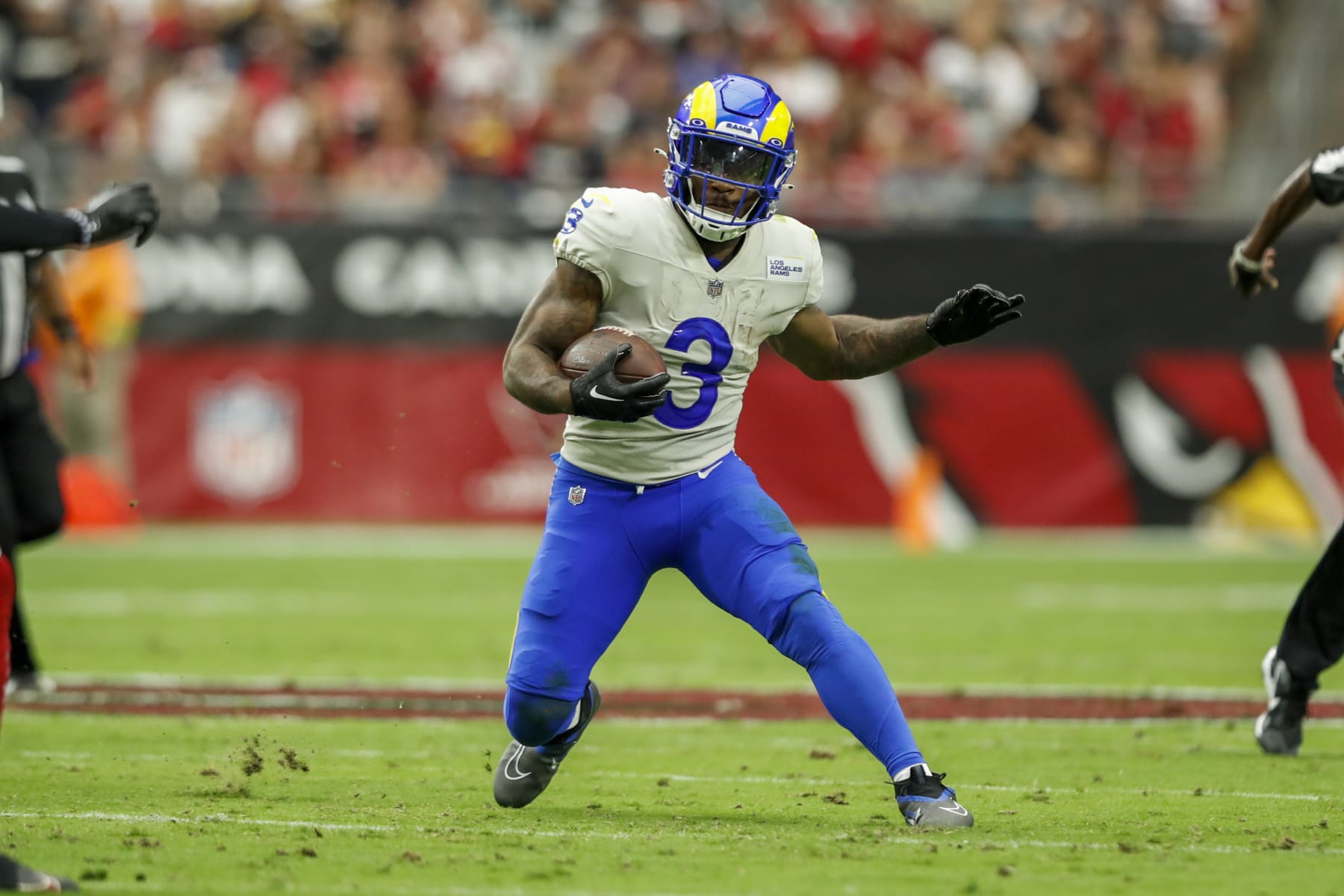 PHOENIX, AZ - SEPTEMBER 25: Los Angeles Rams running back Cam Akers (3) runs the ball for a gain during the NFL game between the Los Angeles Rams and the Arizona Cardinals on September 25, 2022, at State Farm Stadium in Glendale, AZ. (Photo by Jordon Kelly/Icon Sportswire via Getty Images)