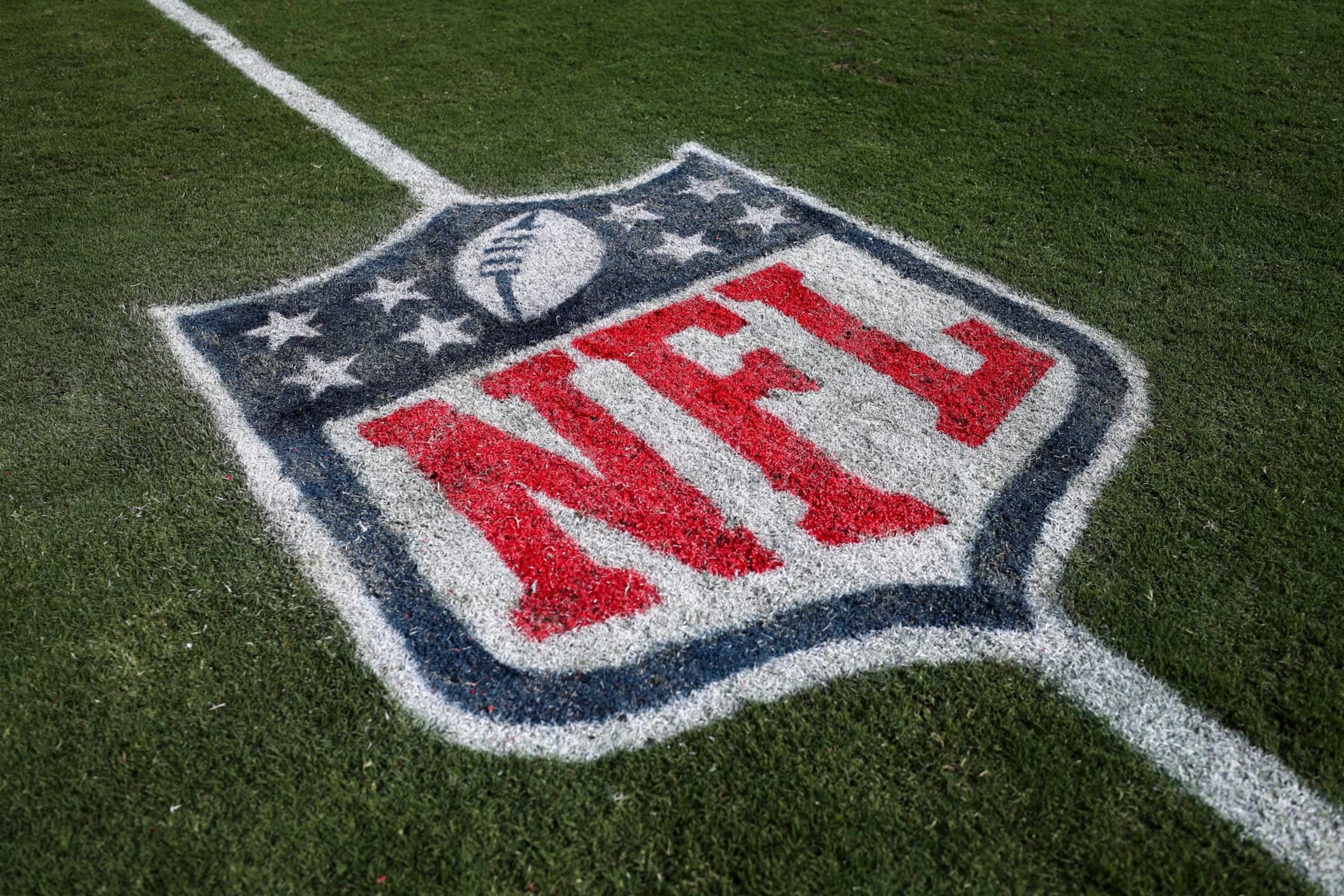 TAMPA, FL - OCTOBER 9: A detail shot of a painted NFL shield logo on the field after an NFL football game between the Tampa Bay Buccaneers and the Atlanta Falcons at Raymond James Stadium on October 9, 2022 in Tampa, Florida. (Photo by Kevin Sabitus/Getty Images) TAMPA, FL - OCTOBER 9: A detail shot of a painted NFL shield logo on the field after an NFL football game between the Tampa Bay Buccaneers and the Atlanta Falcons at Raymond James Stadium on October 9, 2022 in Tampa, Florida. (Photo by Kevin Sabitus/Getty Images)