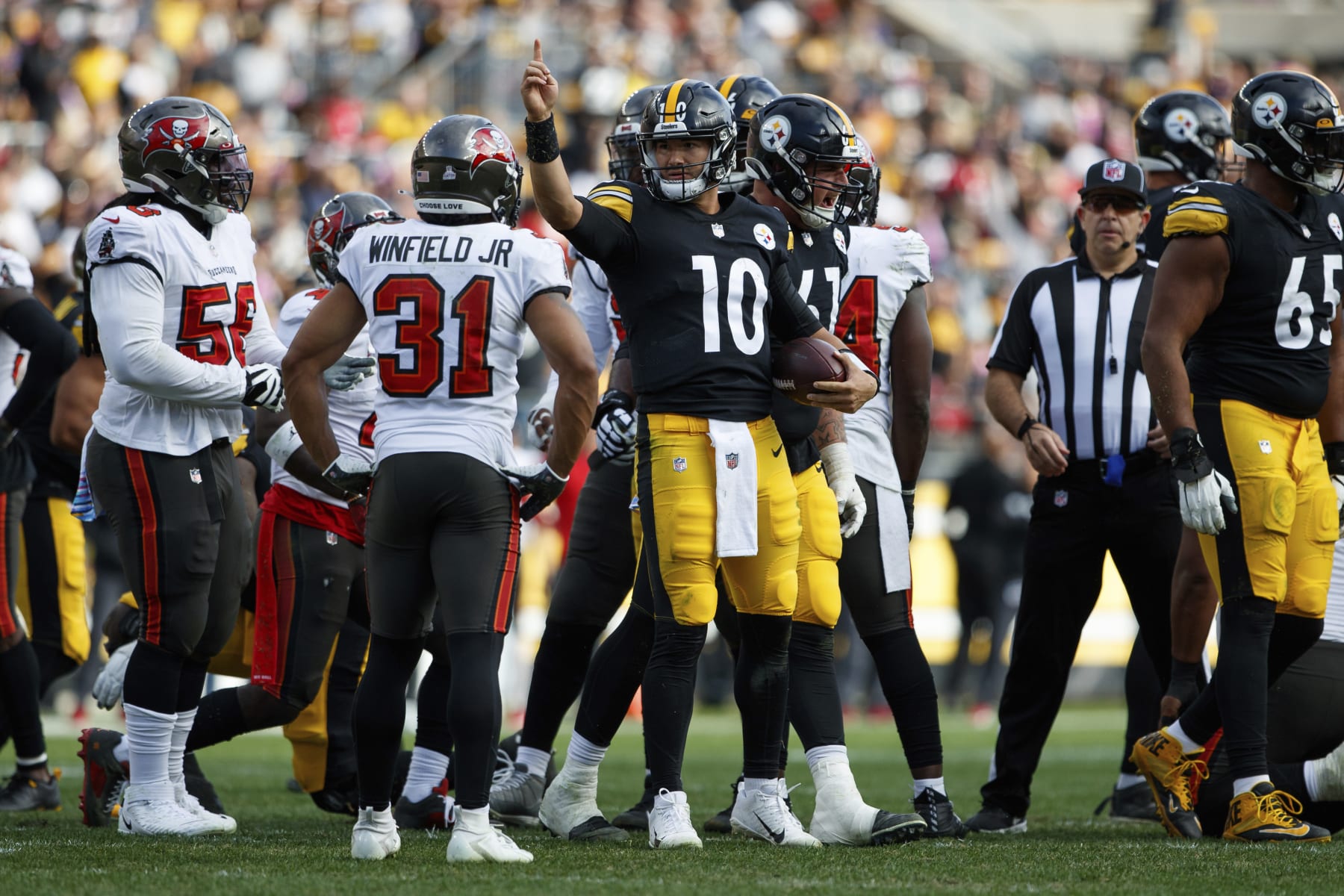 Pittsburgh Steelers quarterback Mitch Trubisky (10) signals for a first down during an NFL football game, Sunday, Oct. 16, 2022, in Pittsburgh, PA. (AP Photo/Matt Durisko)