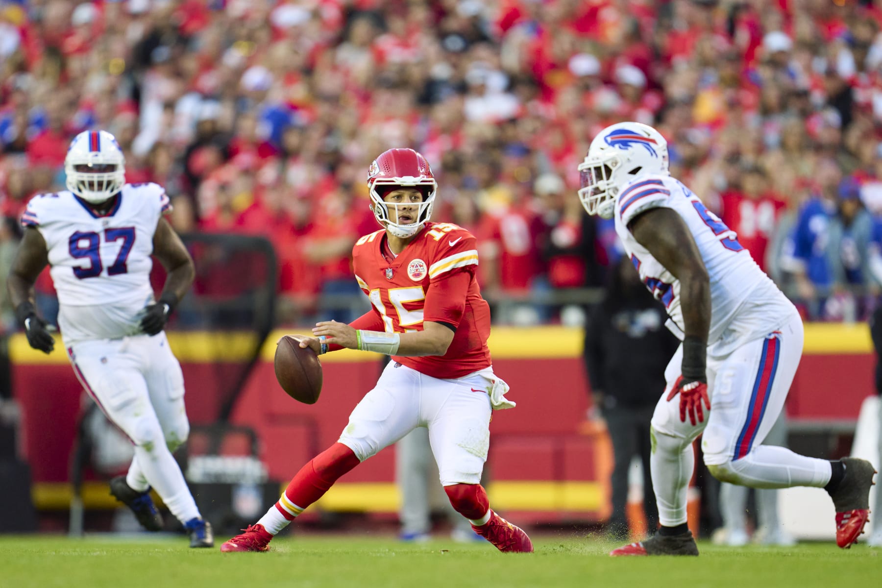 KANSAS CITY, MO - OCTOBER 16: Patrick Mahomes #15 of the Kansas City Chiefs scrambles against the Buffalo Bills during the second half at GEHA Field at Arrowhead Stadium on October 16, 2022 in Kansas City, Missouri. (Photo by Cooper Neill/Getty Images)