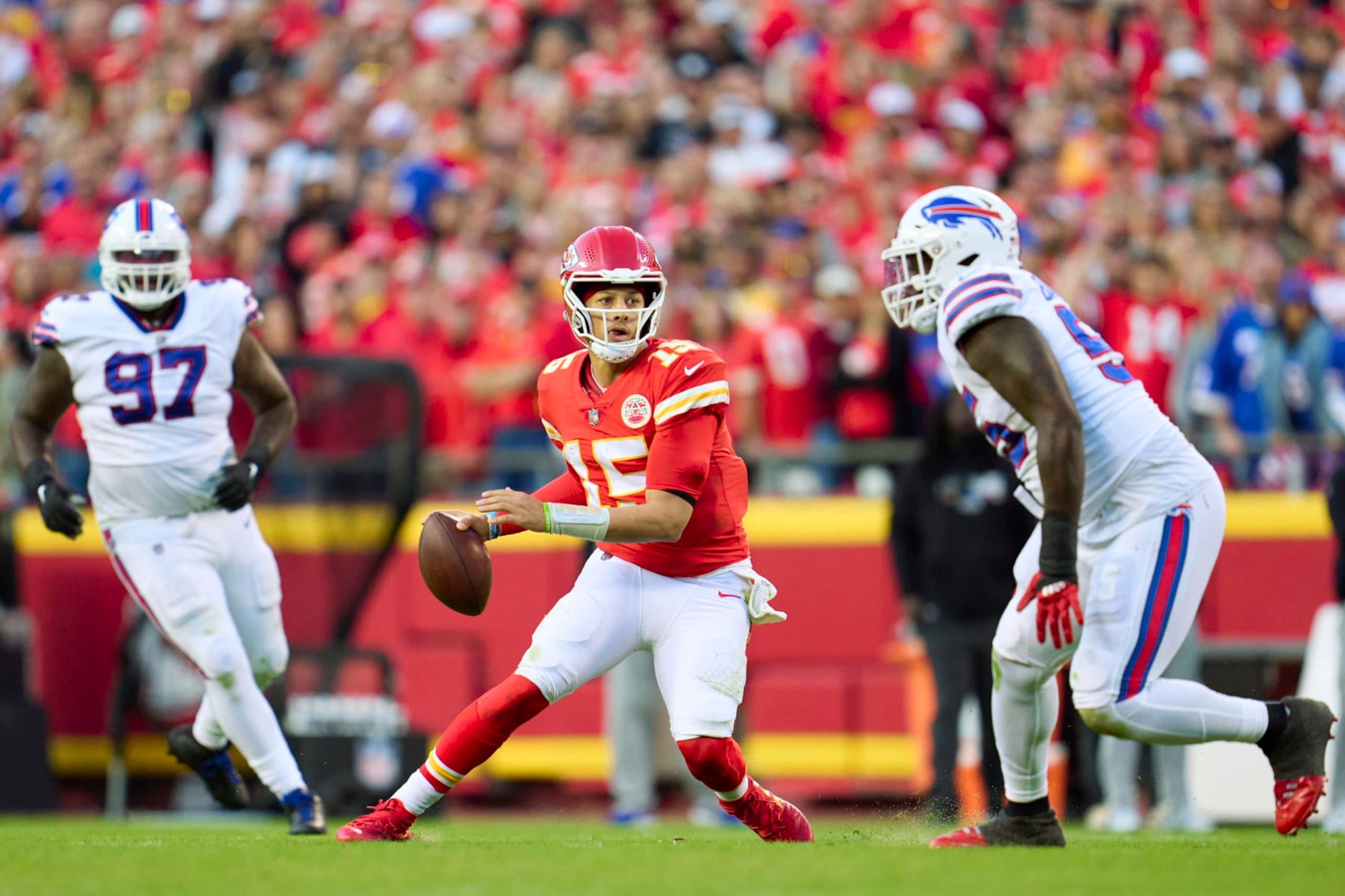 KANSAS CITY, MO - OCTOBER 16: Patrick Mahomes #15 of the Kansas City Chiefs scrambles against the Buffalo Bills during the second half at GEHA Field at Arrowhead Stadium on October 16, 2022 in Kansas City, Missouri. (Photo by Cooper Neill/Getty Images)