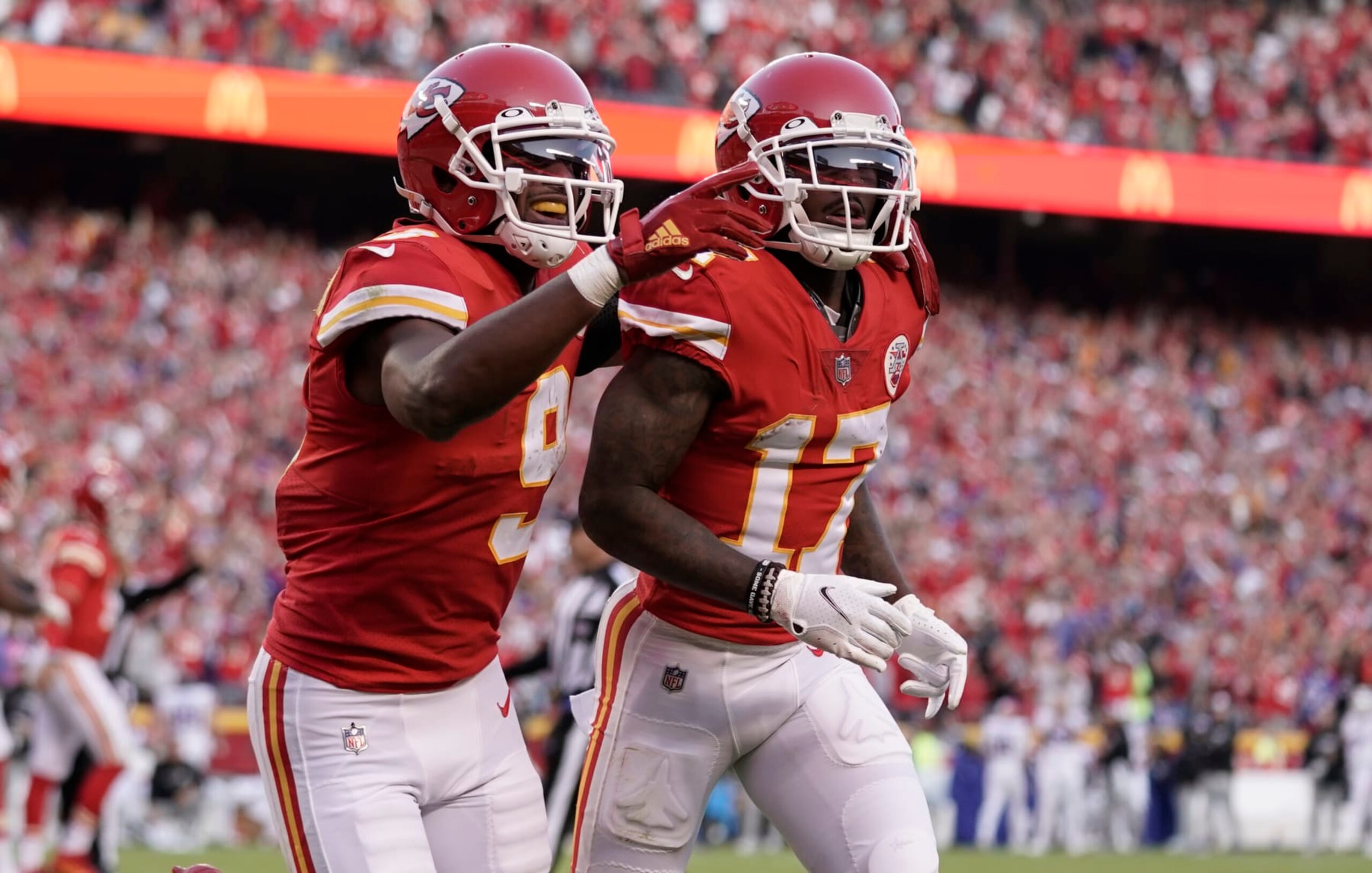 Kansas City Chiefs wide receiver Mecole Hardman (17) is congratulated by JuJu Smith-Schuster (9) after scoring a touchdown during the second half of an NFL football game against the Buffalo Bills Sunday, Oct. 16, 2022, in Kansas City, Mo. (AP Photo/Ed Zurga)