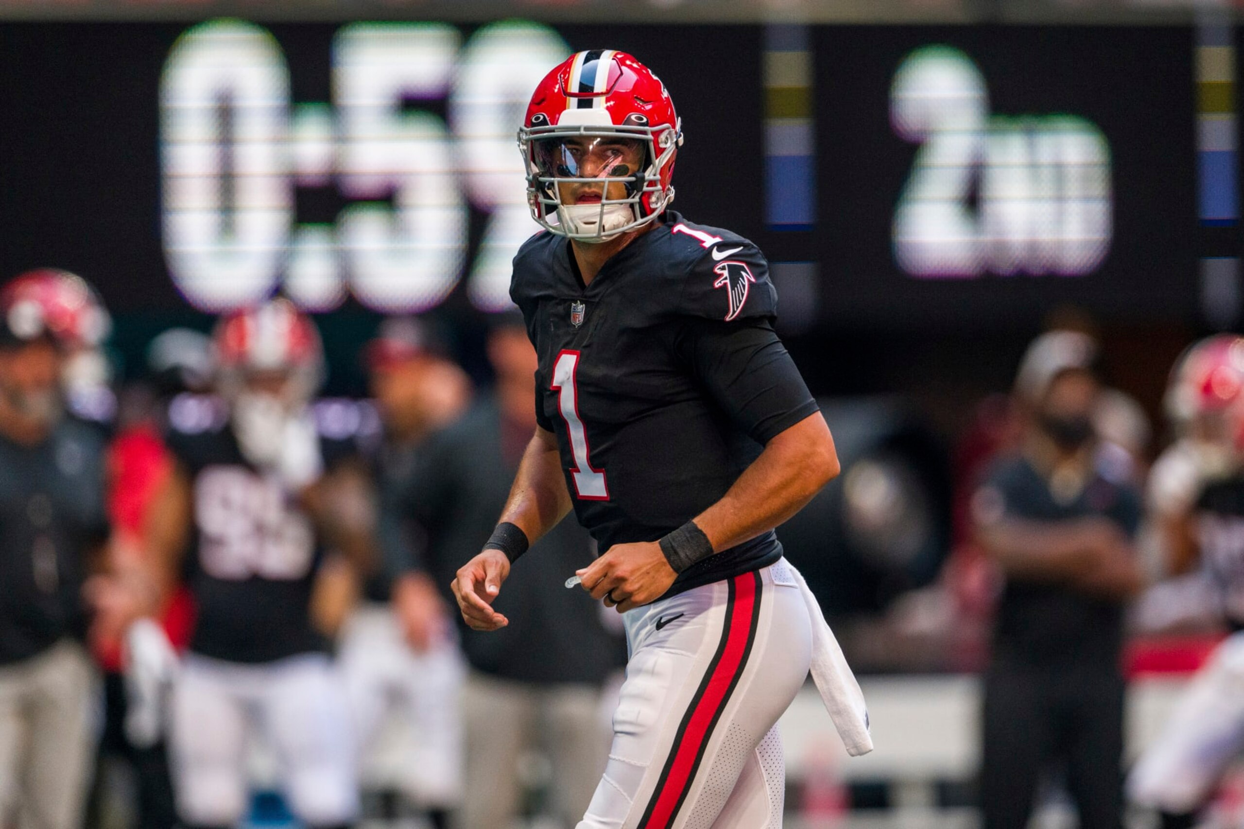 Atlanta Falcons quarterback Marcus Mariota (1) works during the first half of an NFL football game against the San Francisco 49ers, Sunday, Oct. 16, 2022, in Atlanta. (AP Photo/Danny Karnik)