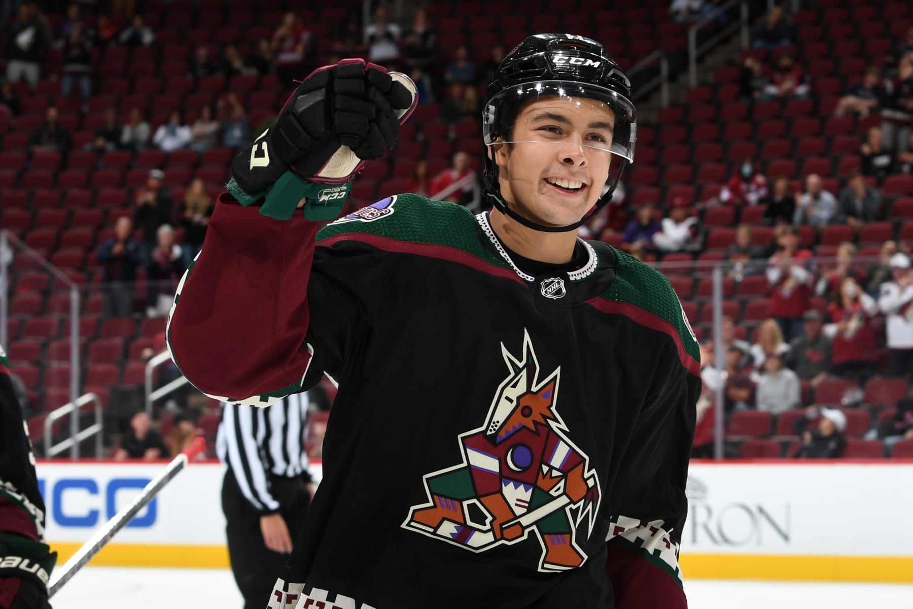 GLENDALE, ARIZONA - SEPTEMBER 27: Dylan Guenther #11 of the Arizona Coyotes celebrates after scoring a goal against the Los Angeles Kings at Gila River Arena on September 27, 2021 in Glendale, Arizona. (Photo by Norm Hall/NHLI via Getty Images)