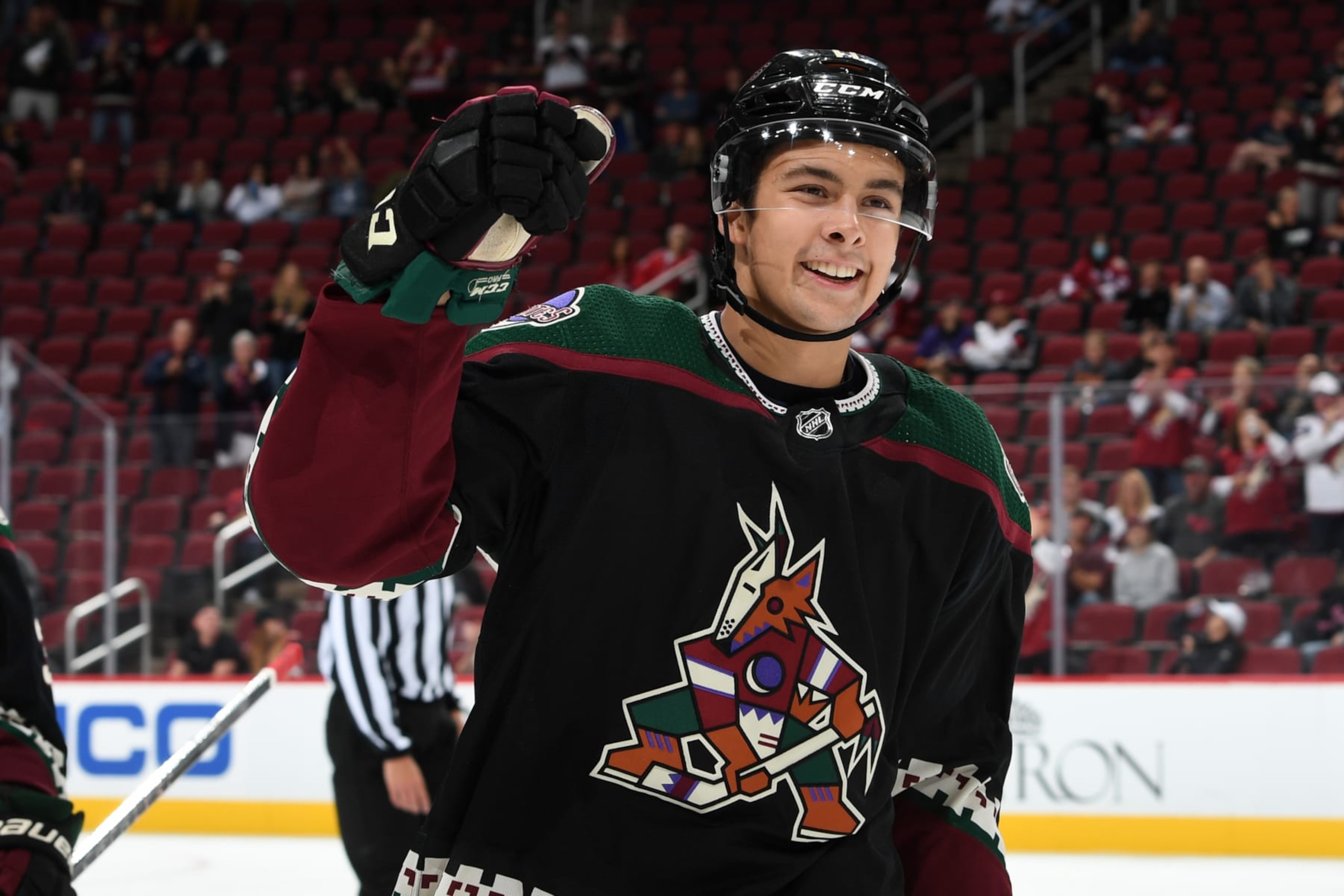 GLENDALE, ARIZONA - SEPTEMBER 27: Dylan Guenther #11 of the Arizona Coyotes celebrates after scoring a goal against the Los Angeles Kings at Gila River Arena on September 27, 2021 in Glendale, Arizona. (Photo by Norm Hall/NHLI via Getty Images)
