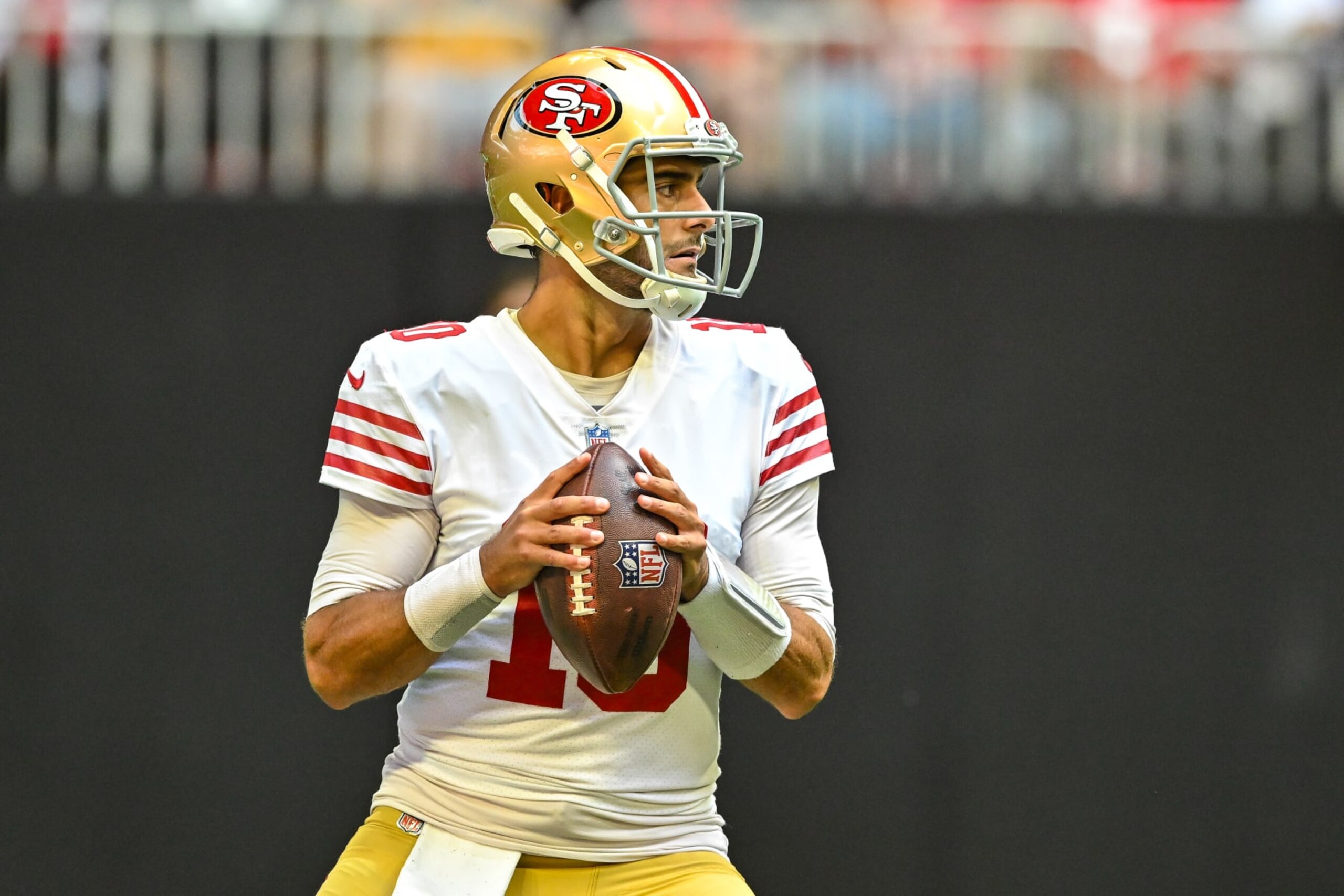 ATLANTA, GA  OCTOBER 16:  San Francisco quarterback Jimmy Garoppolo (10) drops back to pass during the NFL game between the San Francisco 49ers and the Atlanta Falcons on October 16th, 2022 at Mercedes-Benz Stadium in Atlanta, GA.  (Photo by Rich von Biberstein/Icon Sportswire via Getty Images)