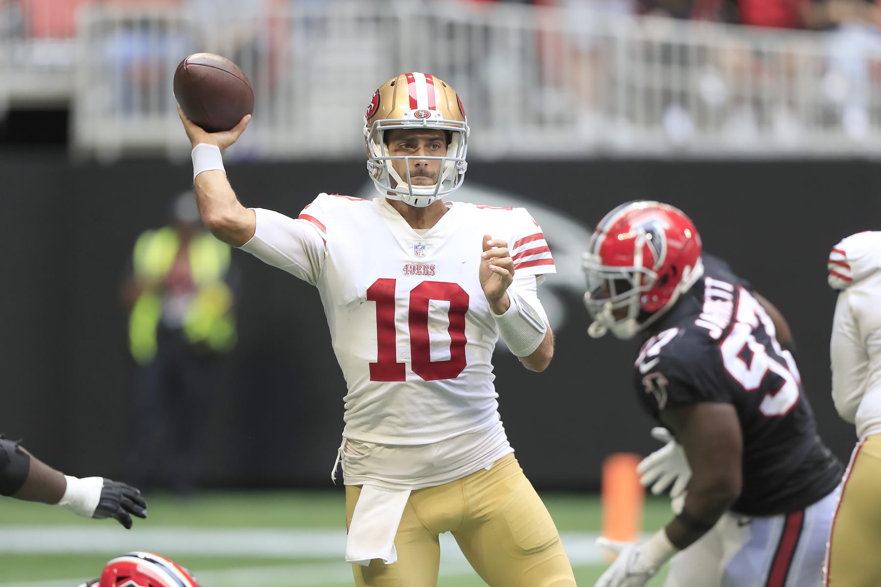 ATLANTA, GA - OCTOBER 16: San Francisco 49ers quarterback Jimmy Garoppolo (10) passes during the NFL football game between the Atlanta Falcons and the San Francisco 49ers on October 16, 2022 at Mercedes-Benz Stadium in Atlanta, Georgia.  (Photo by David J. Griffin/Icon Sportswire via Getty Images)