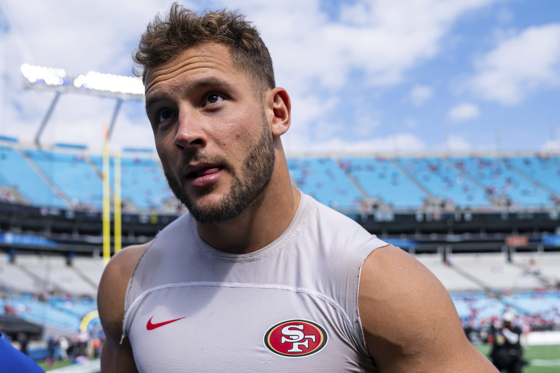 San Francisco 49ers defensive end Nick Bosa (97) looks on before an NFL football game against the Carolina Panthers on Sunday, Oct. 9, 2022, in Charlotte, N.C. (AP Photo/Jacob Kupferman)