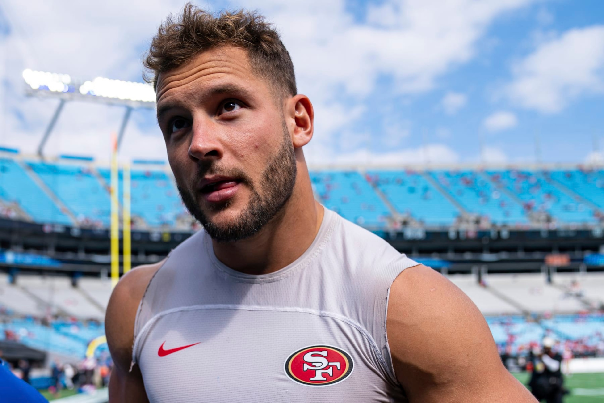 San Francisco 49ers defensive end Nick Bosa (97) looks on before an NFL football game against the Carolina Panthers on Sunday, Oct. 9, 2022, in Charlotte, N.C. (AP Photo/Jacob Kupferman)