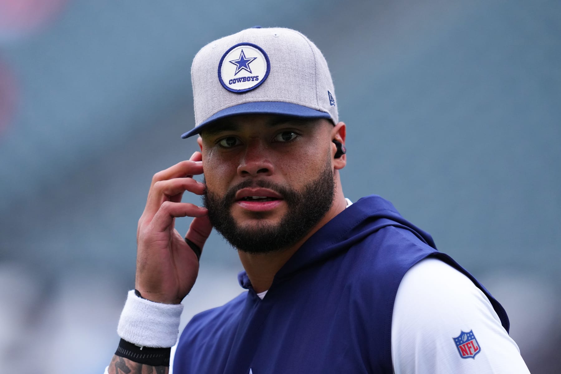 PHILADELPHIA, PENNSYLVANIA - OCTOBER 16: Dak Prescott #4 of the Dallas Cowboys looks on from the field prior to the game against the Philadelphia Eagles at Lincoln Financial Field on October 16, 2022 in Philadelphia, Pennsylvania. (Photo by Mitchell Leff/Getty Images)