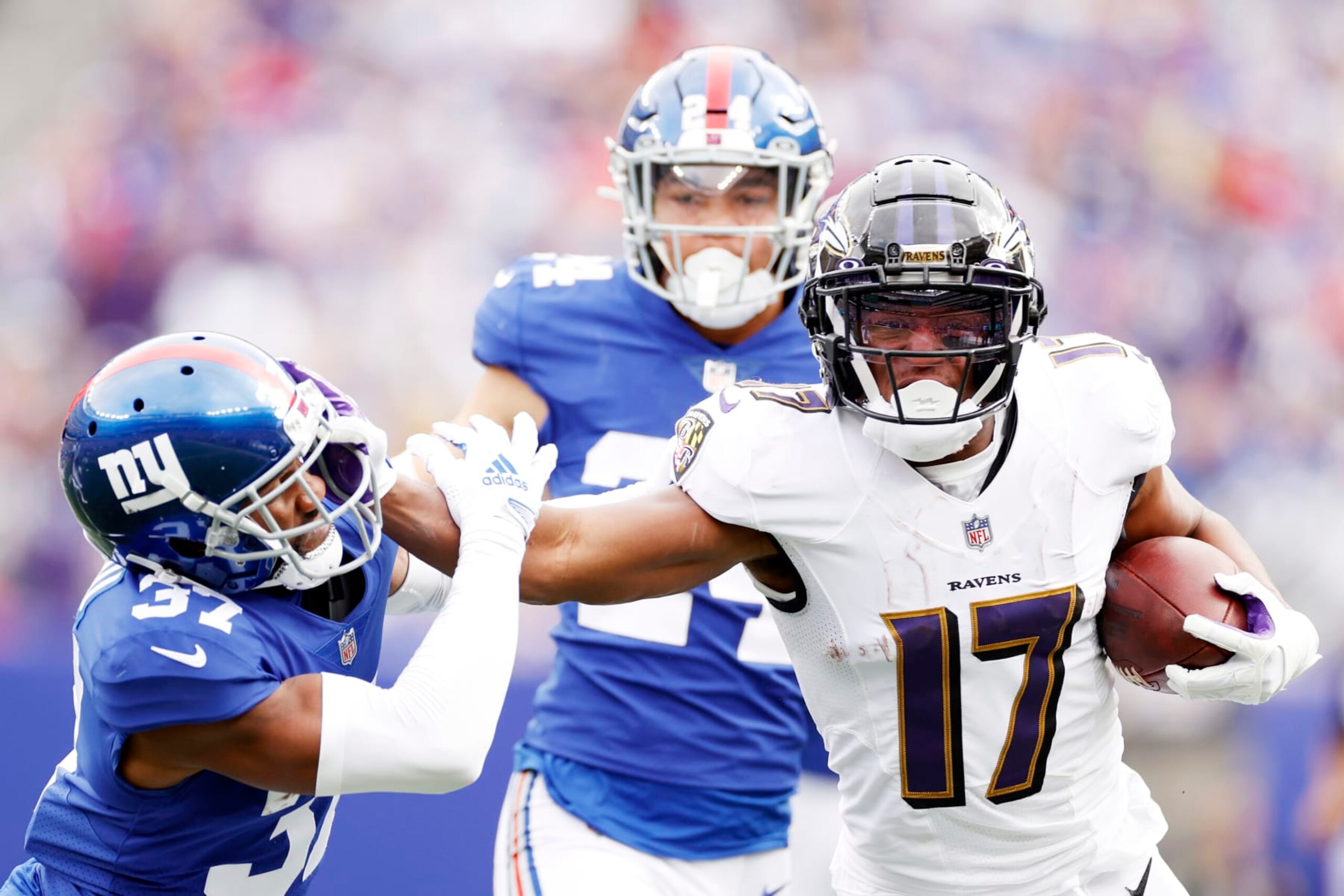 EAST RUTHERFORD, NEW JERSEY - OCTOBER 16: Kenyan Drake #17 of the Baltimore Ravens runs the ball against Fabian Moreau #37 of the New York Giants during the second quarter at MetLife Stadium on October 16, 2022 in East Rutherford, New Jersey. (Photo by Sarah Stier/Getty Images)