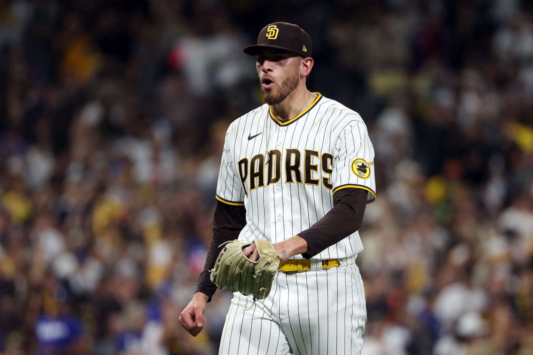 SAN DIEGO, CALIFORNIA - OCTOBER 15: Joe Musgrove #44 of the San Diego Padres reacts after striking out Will Smith #16 of the Los Angeles Dodgers during the fifth inning in game four of the National League Division Series at PETCO Park on October 15, 2022 in San Diego, California. (Photo by Harry How/Getty Images)
