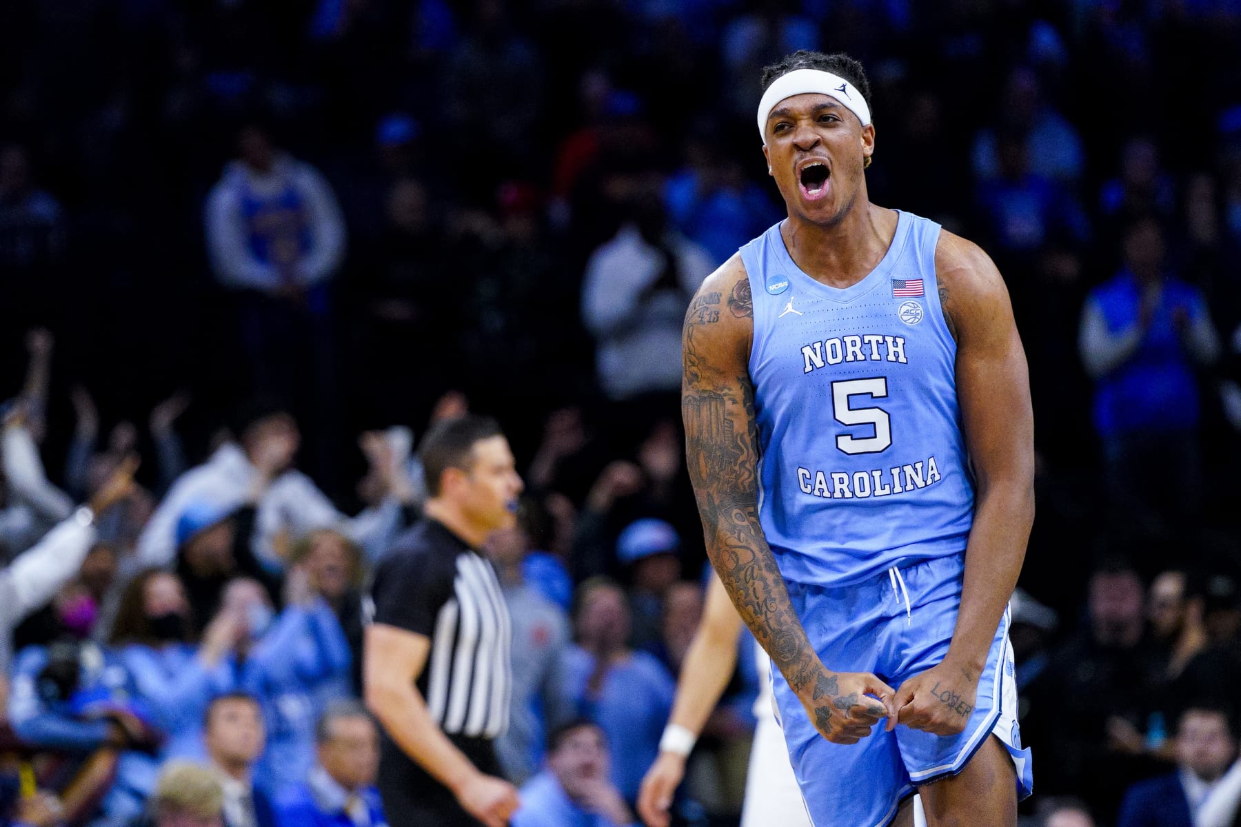 North Carolina's Armando Bacot reacts during the second half of a college basketball game against UCLA in the Sweet 16 round of the NCAA tournament, Friday, March 25, 2022, in Philadelphia. (AP Photo/Chris Szagola)